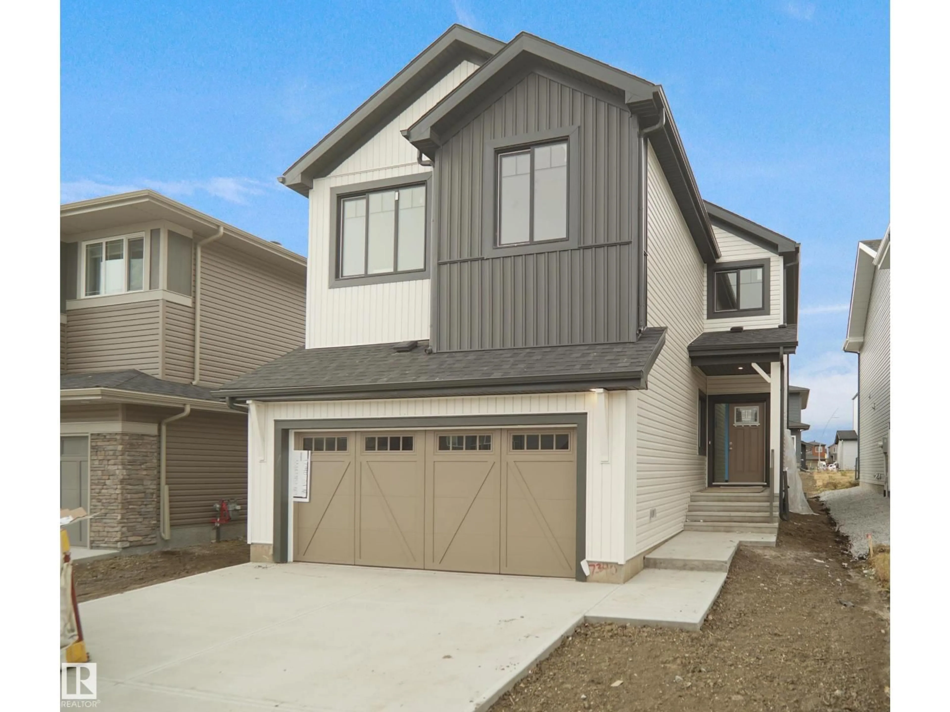 Home with vinyl exterior material, street for NE - 17340 7 ST, Edmonton Alberta T5Y4E7