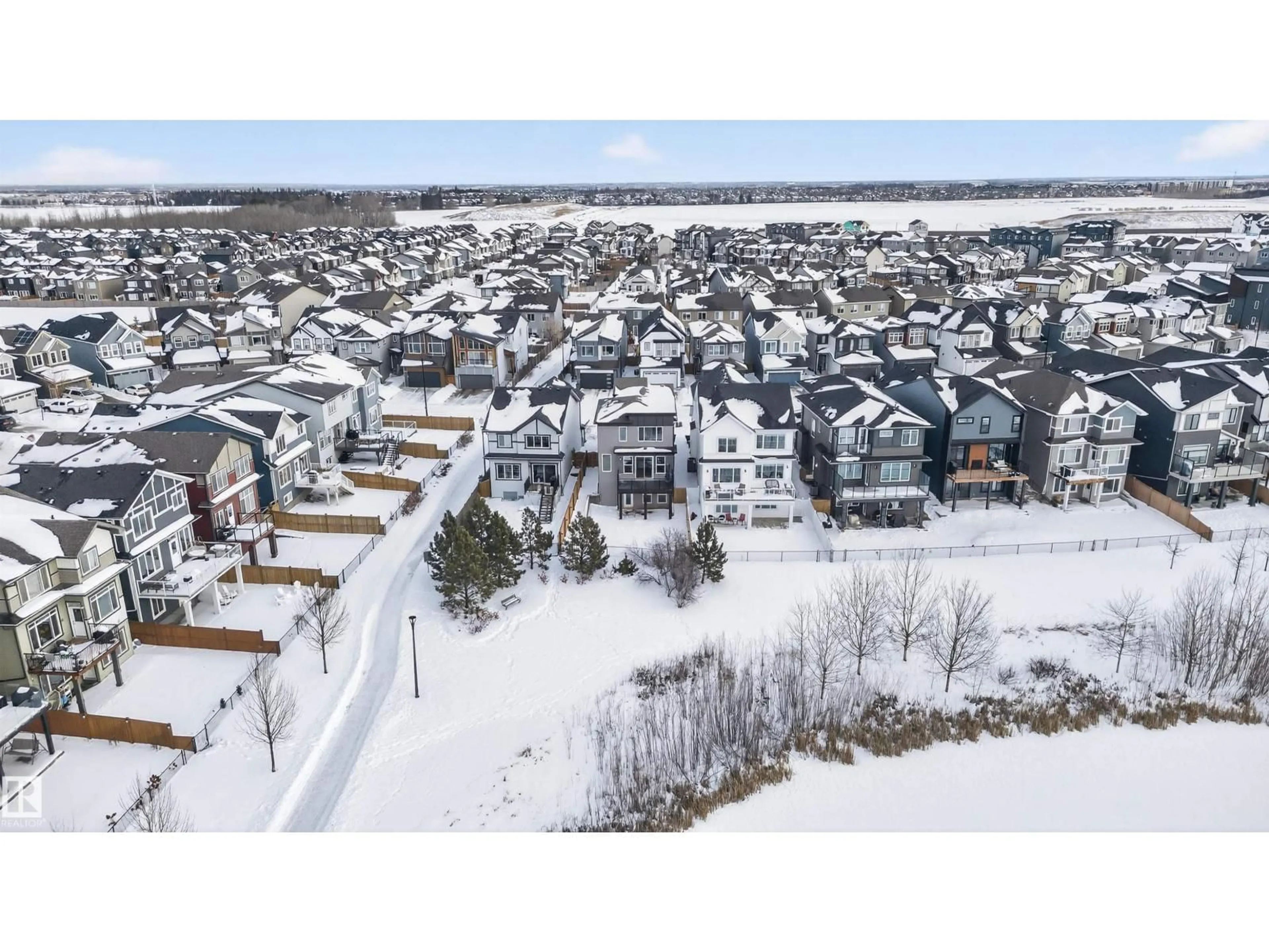 A pic from outside/outdoor area/front of a property/back of a property/a pic from drone, mountain view for 3230 PARKER LOOP, Edmonton Alberta T6W4R8