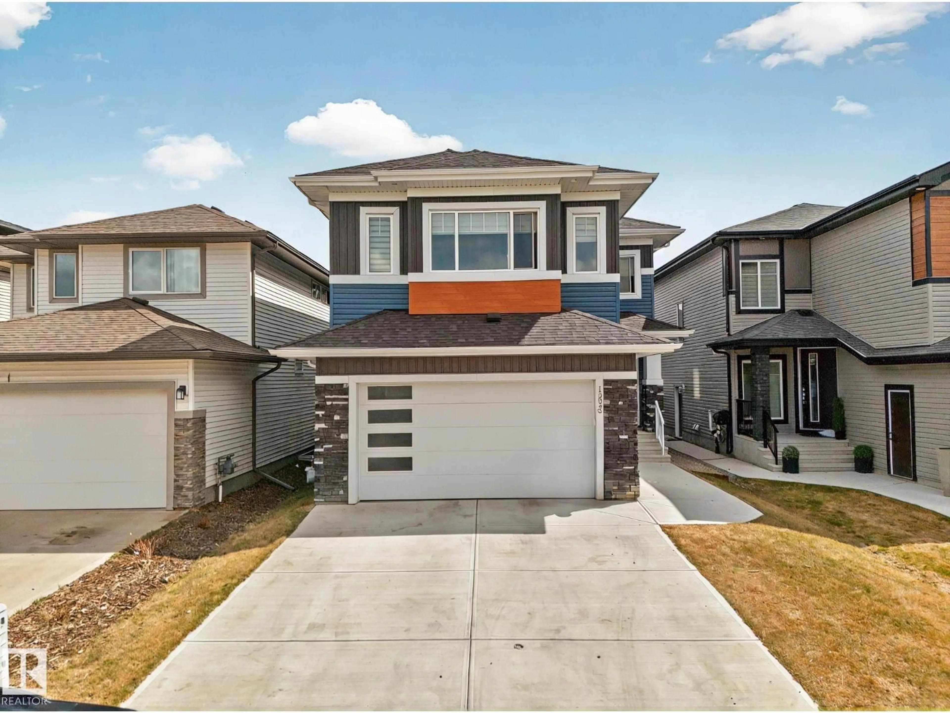 Home with vinyl exterior material, street for 15023 15 ST, Edmonton Alberta T5Y3T4