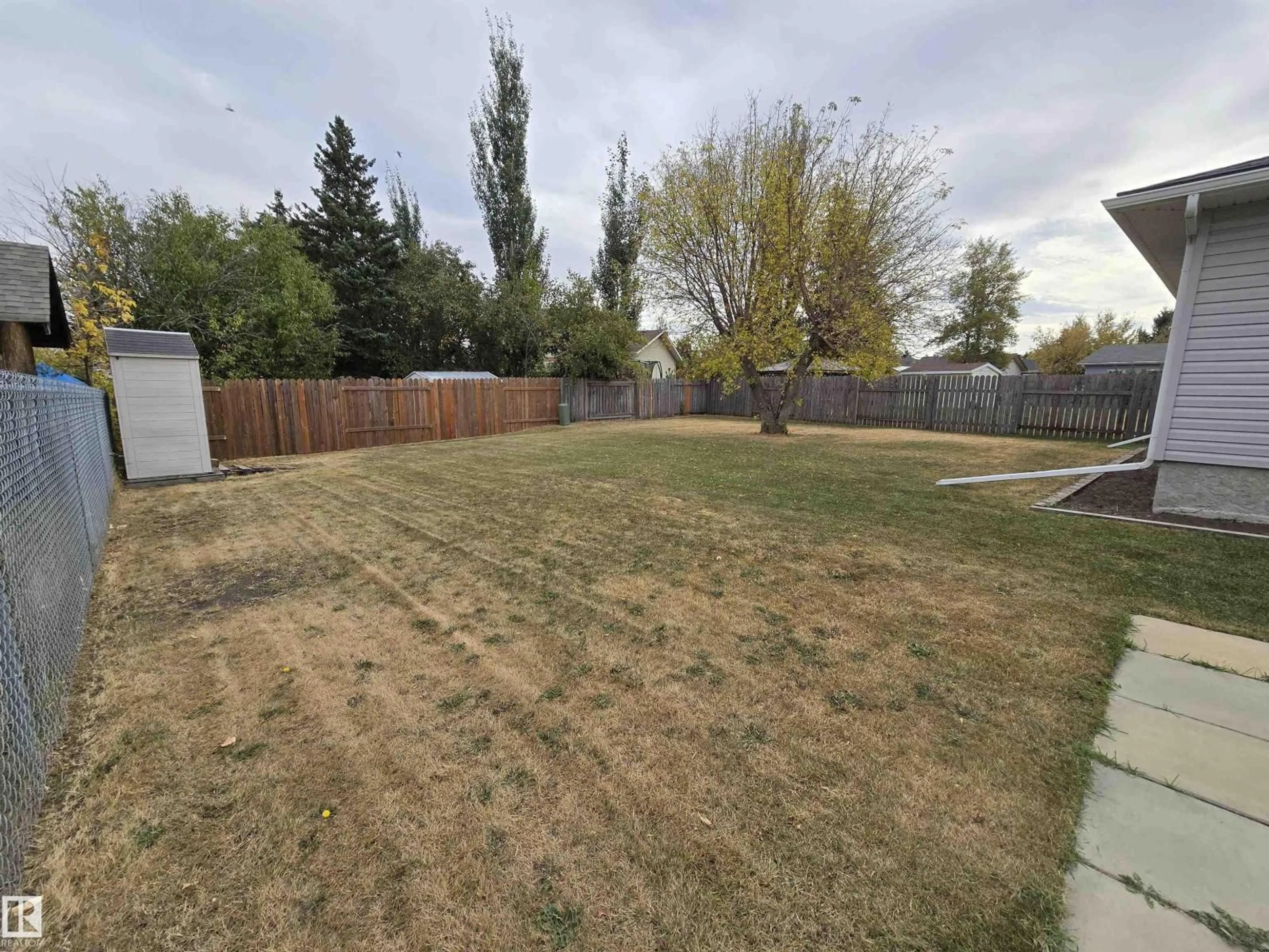 A pic from outside/outdoor area/front of a property/back of a property/a pic from drone, unknown for 119 DIAMOND DR, Millet Alberta T0C1Z0