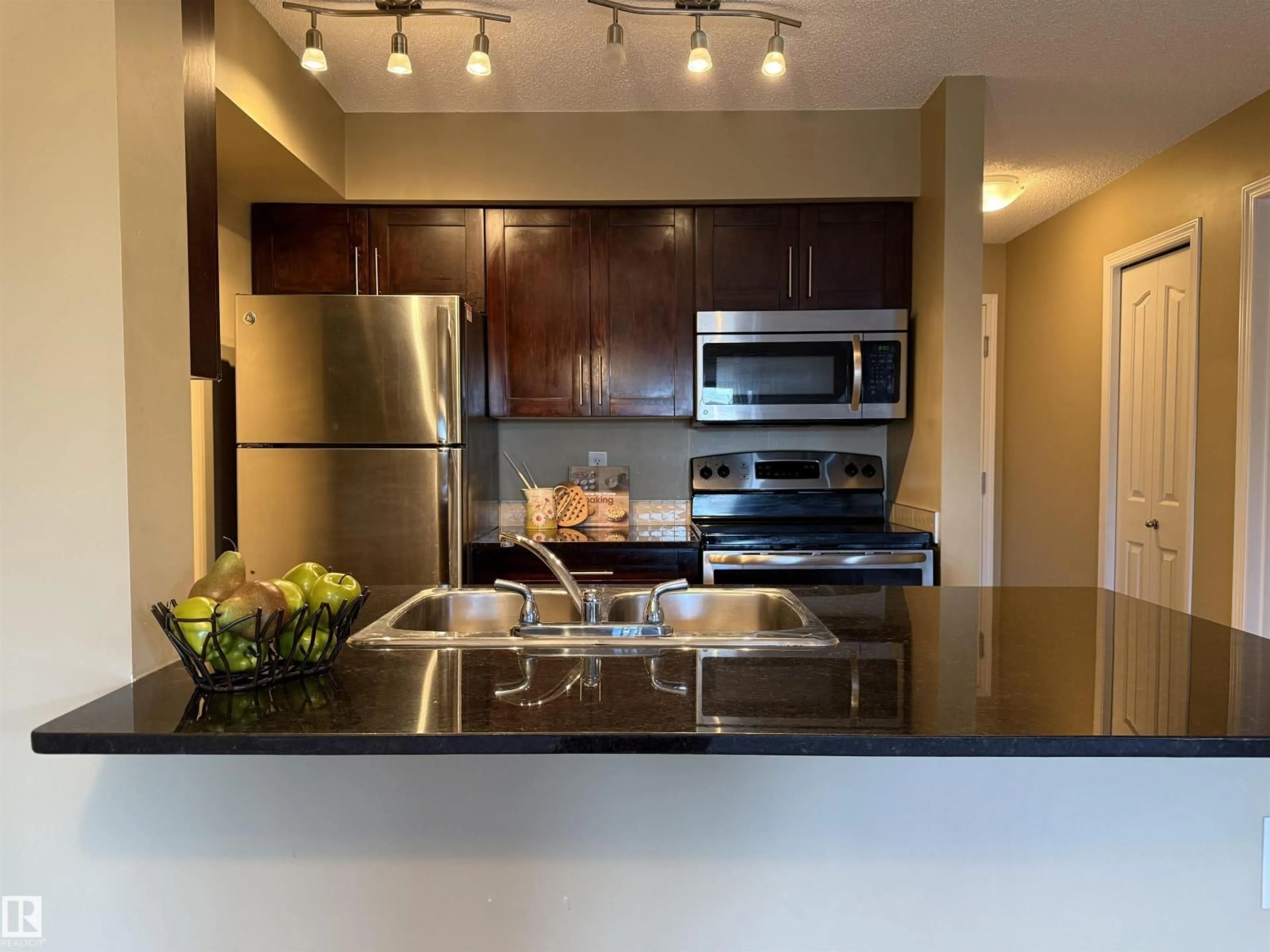 Open concept kitchen, unknown for #214 - 274 MCCONACHIE DR, Edmonton Alberta T5Y3N4