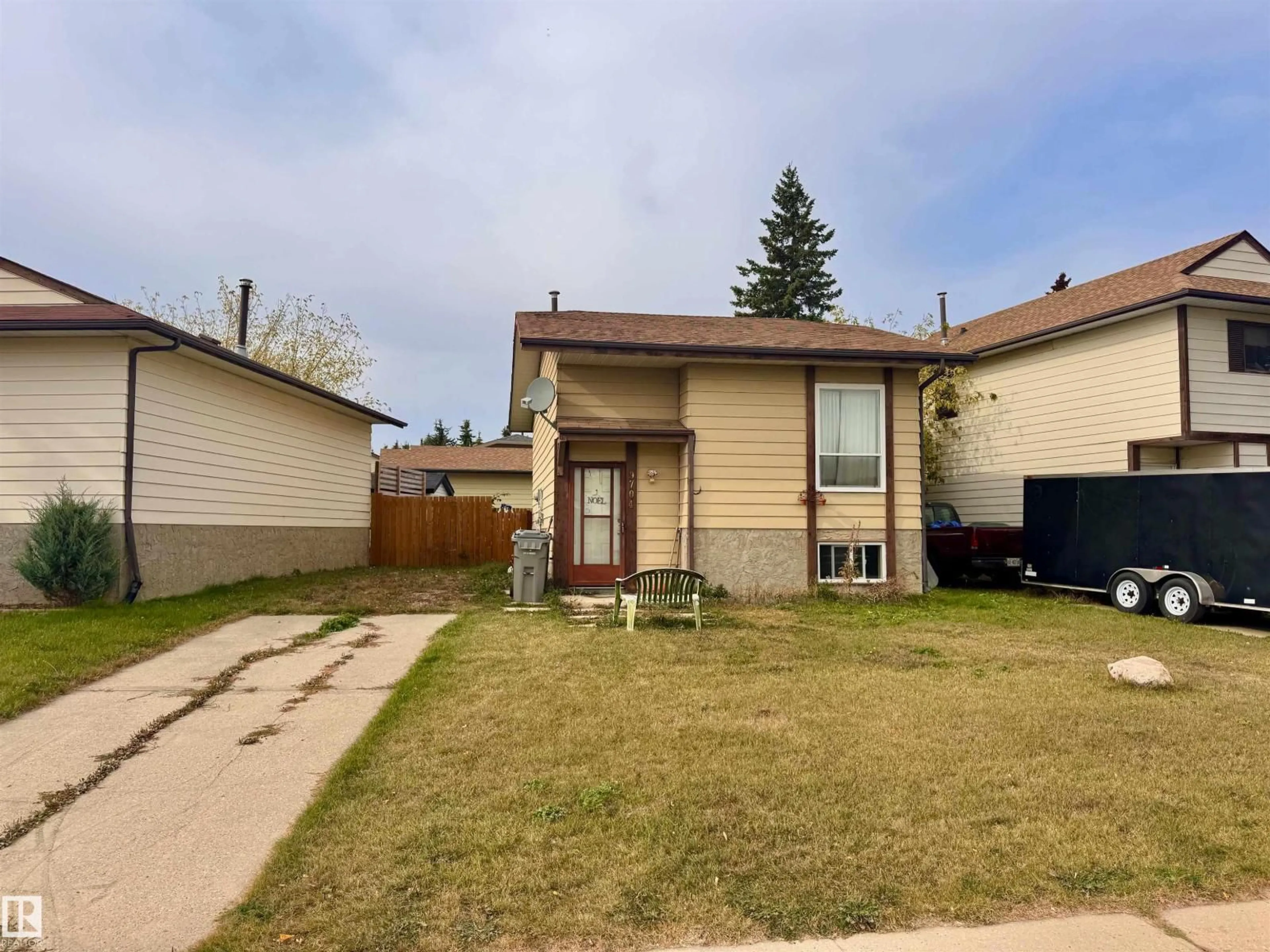 A pic from outside/outdoor area/front of a property/back of a property/a pic from drone, street for 9704 104 ST, Morinville Alberta T8R1C8