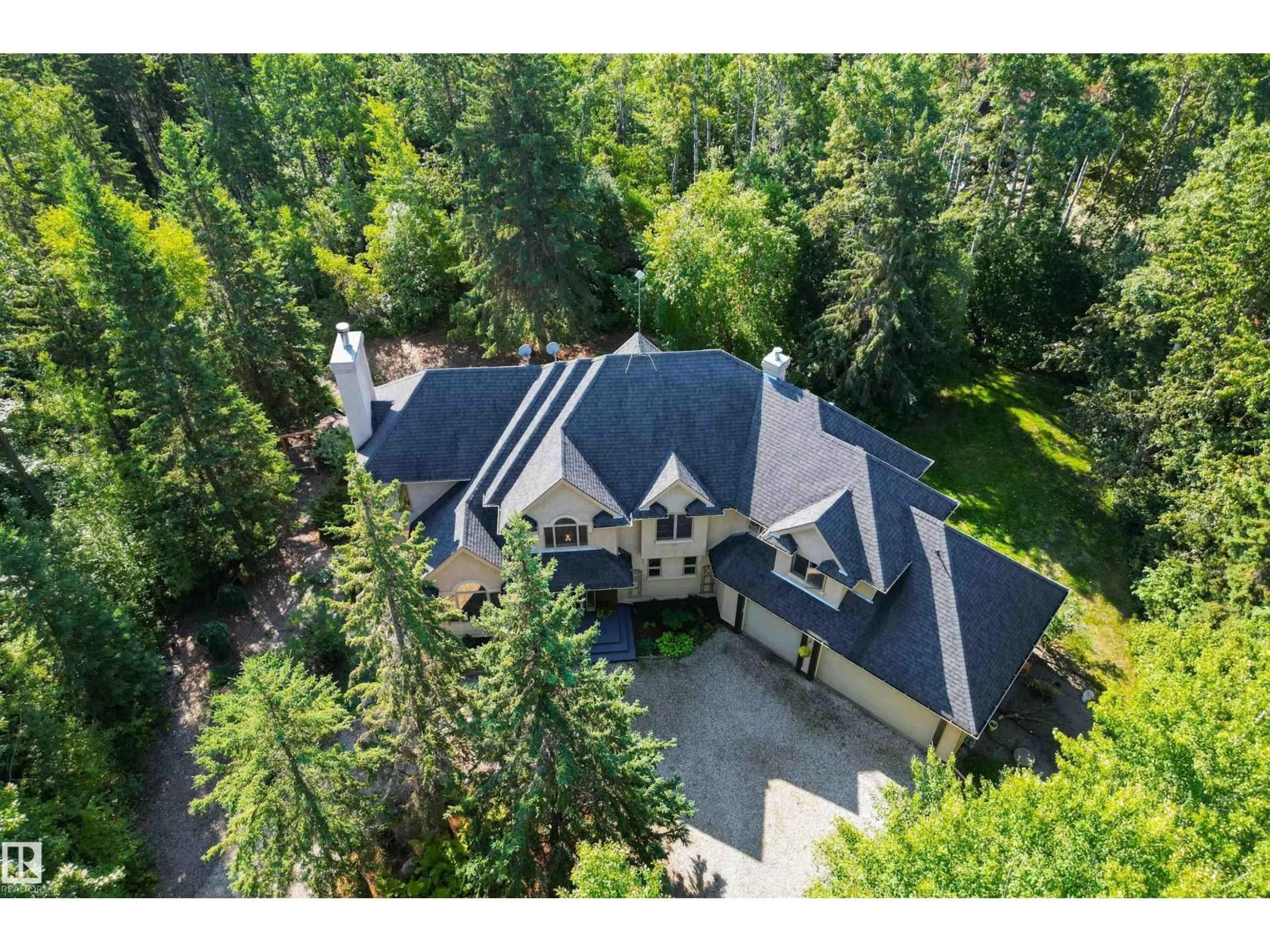 A pic from outside/outdoor area/front of a property/back of a property/a pic from drone, unknown for 27107 TWP ROAD 510, Rural Parkland County Alberta T7Y1H6