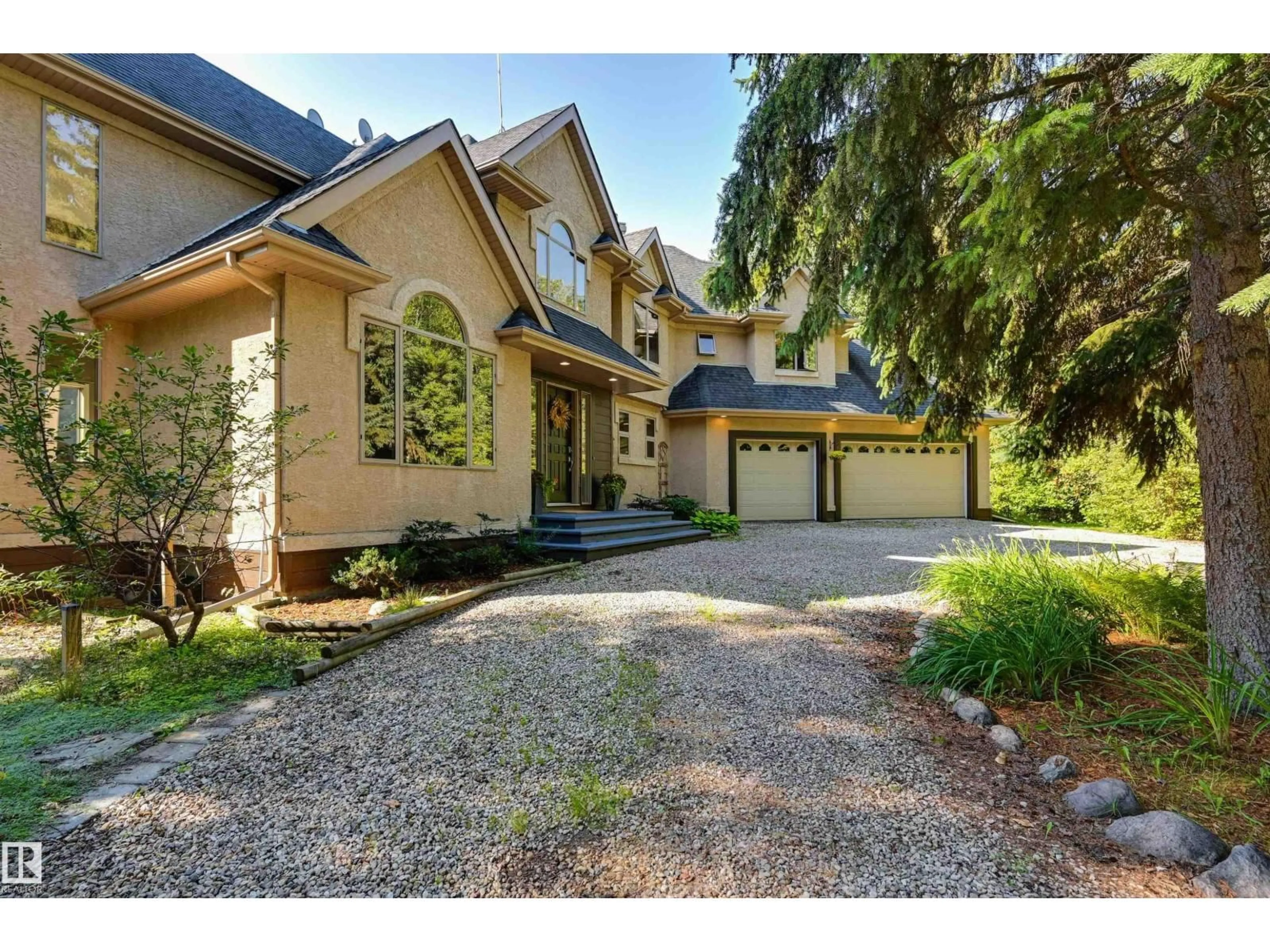 Home with brick exterior material, street for 27107 TWP ROAD 510, Rural Parkland County Alberta T7Y1H6