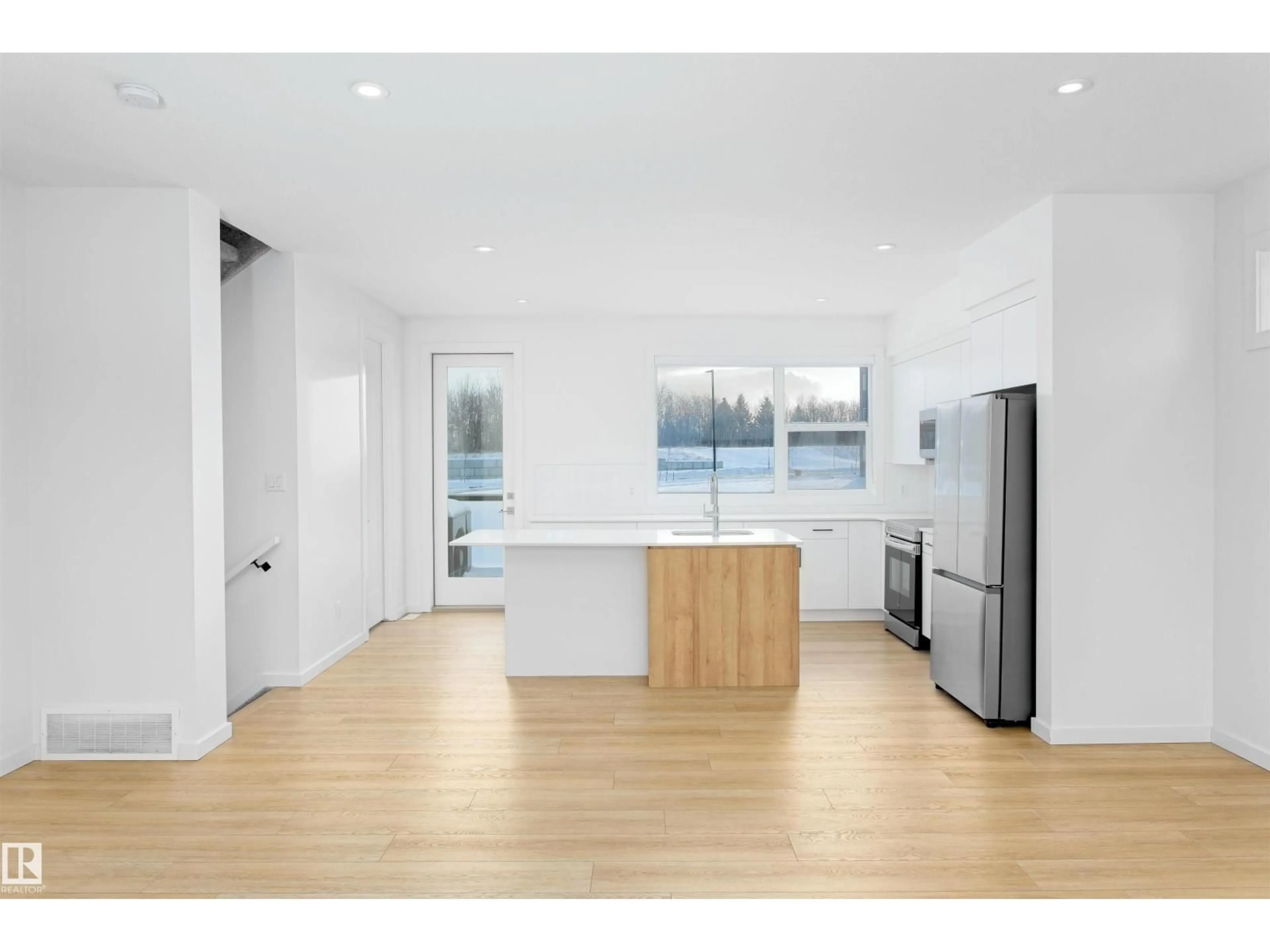 Open concept kitchen, wood/laminate floor for 5 - 4 RONDEAU DR, St. Albert Alberta T8N7X8