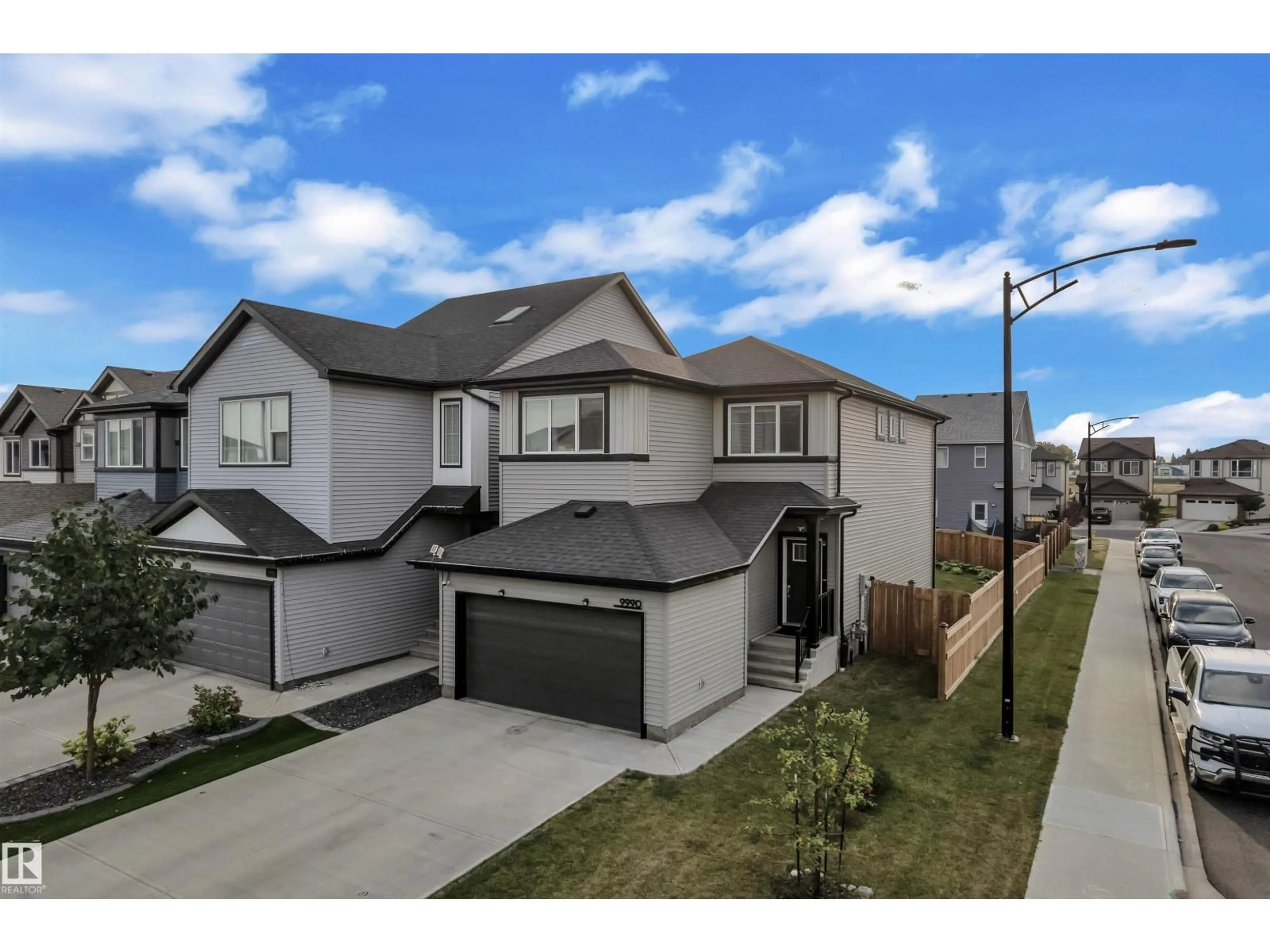 A pic from outside/outdoor area/front of a property/back of a property/a pic from drone, street for NW - 9990 205A ST, Edmonton Alberta T5T7N4