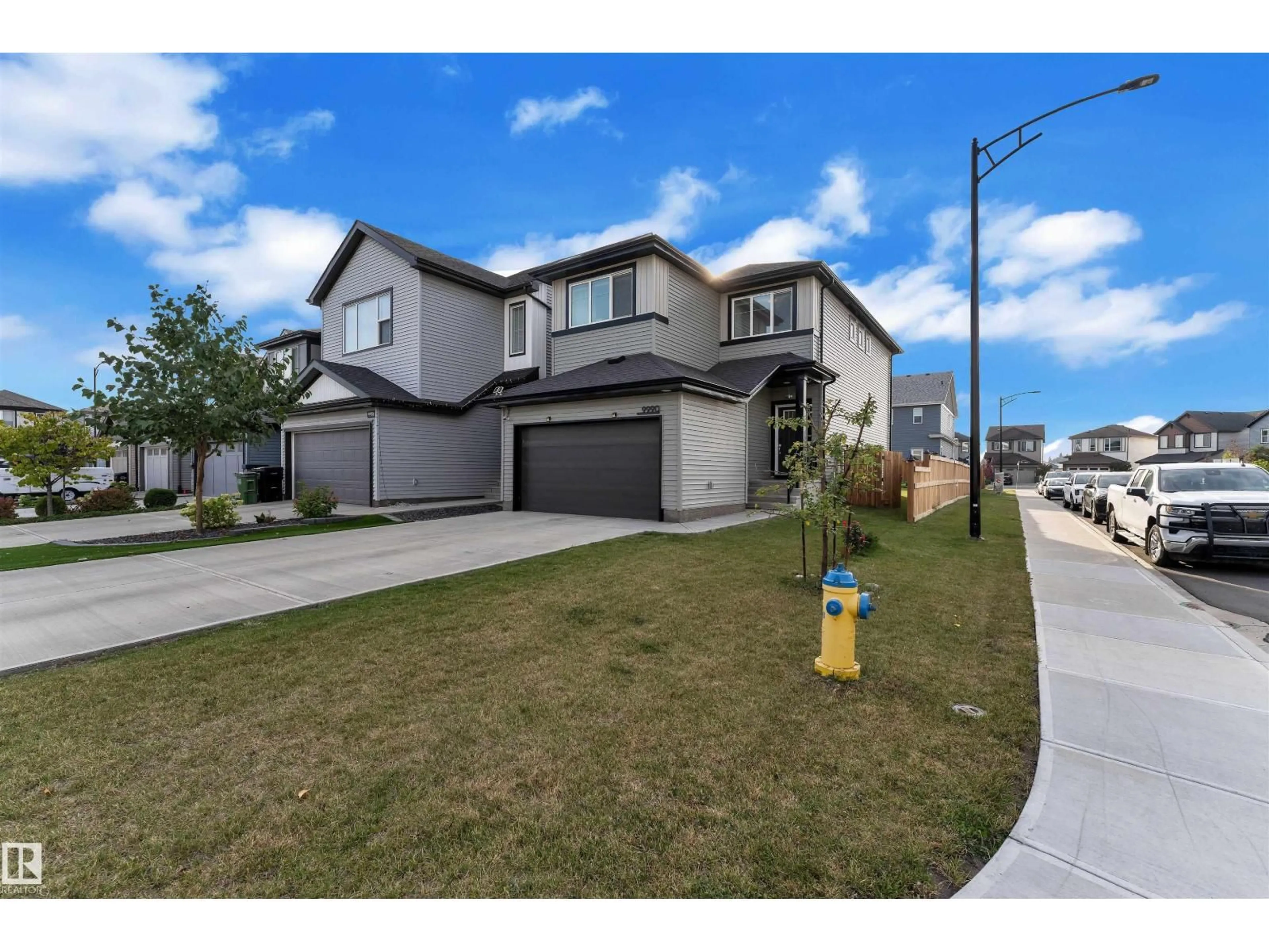 A pic from outside/outdoor area/front of a property/back of a property/a pic from drone, street for NW - 9990 205A ST, Edmonton Alberta T5T7N4