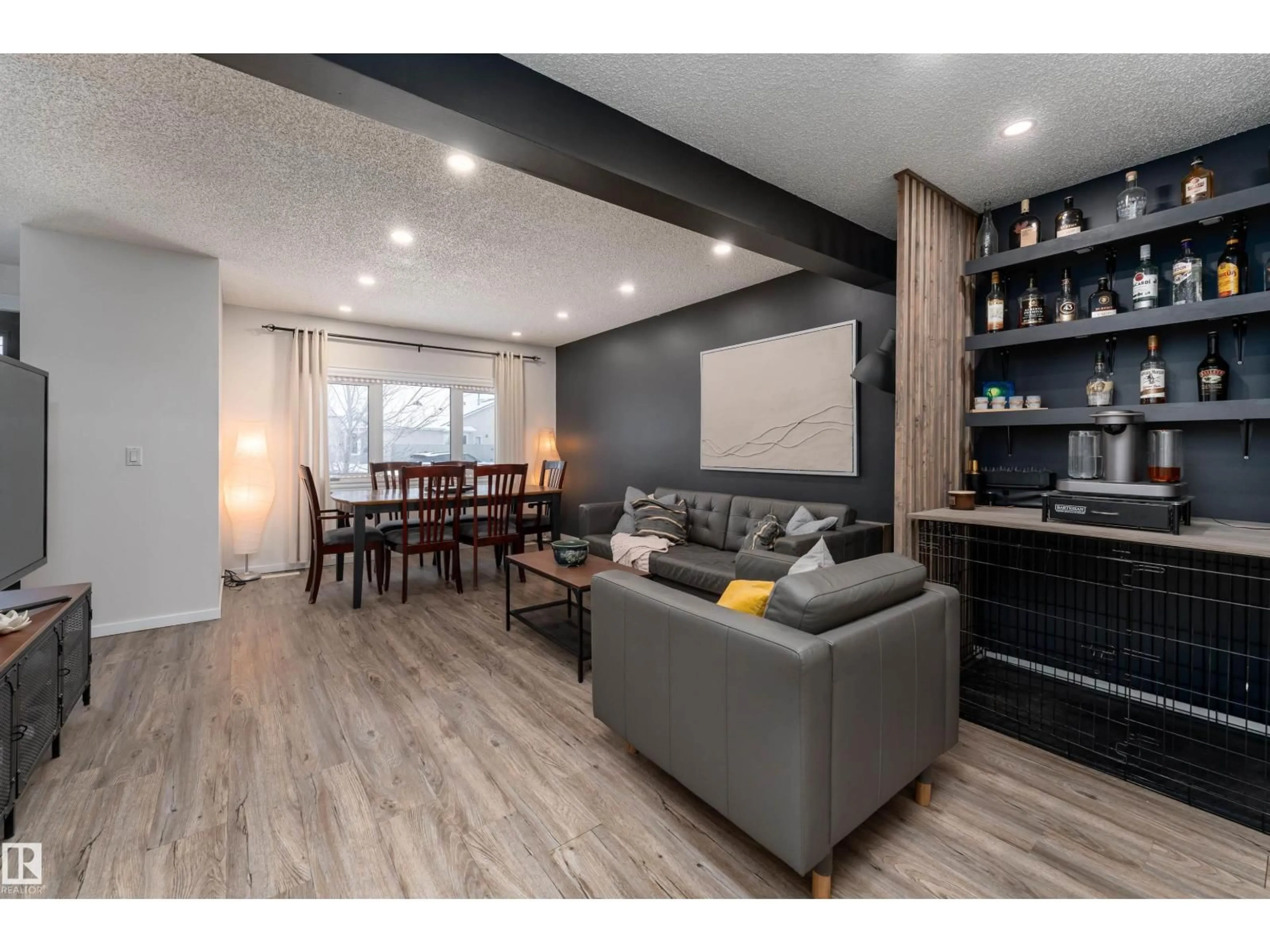 Living room with furniture, wood/laminate floor for 425 KIRKPATRICK CR, Edmonton Alberta T6L5C9