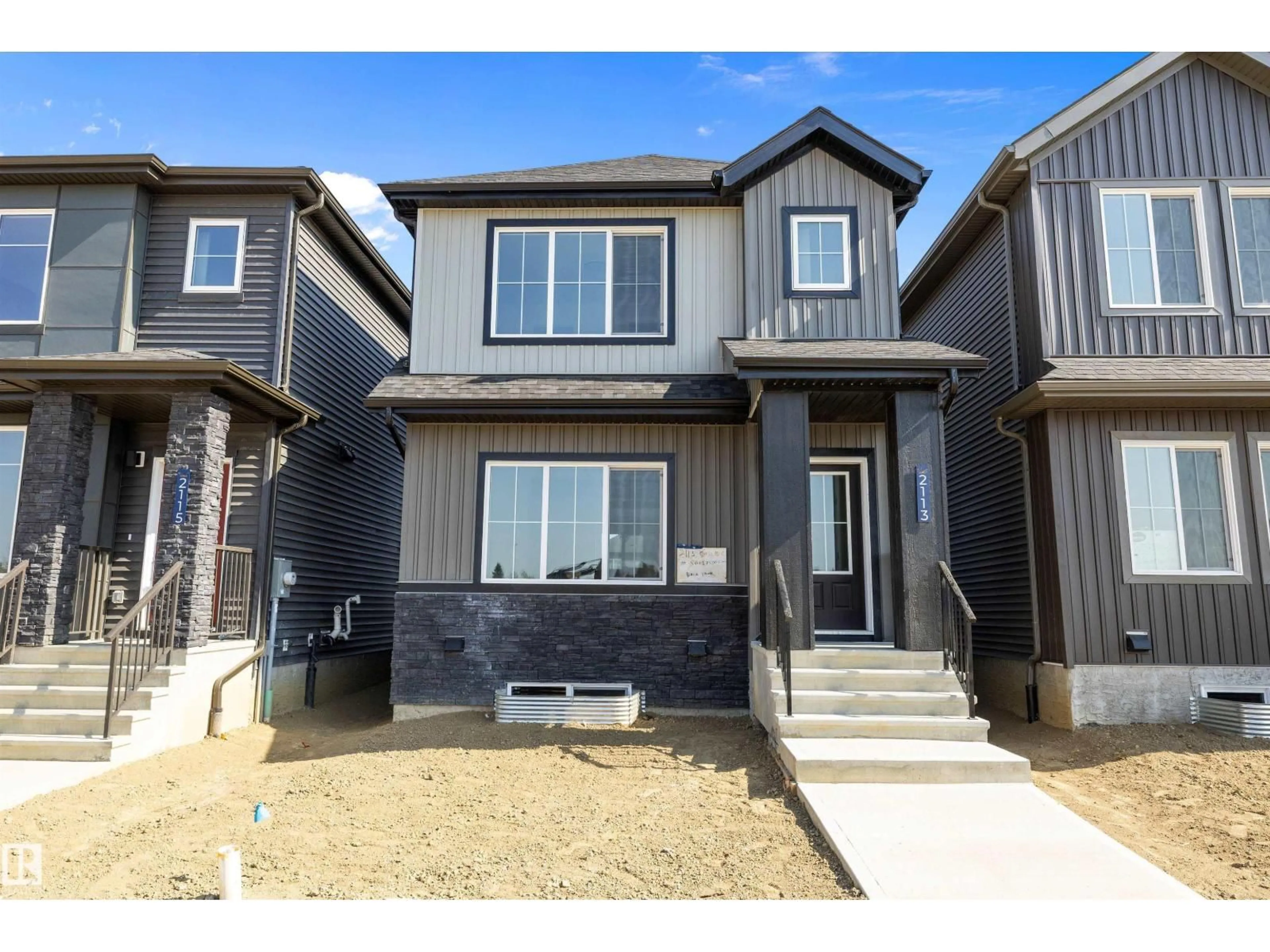 Home with vinyl exterior material, street for 2113 CROSSBILL LN, Edmonton Alberta T5S0W3