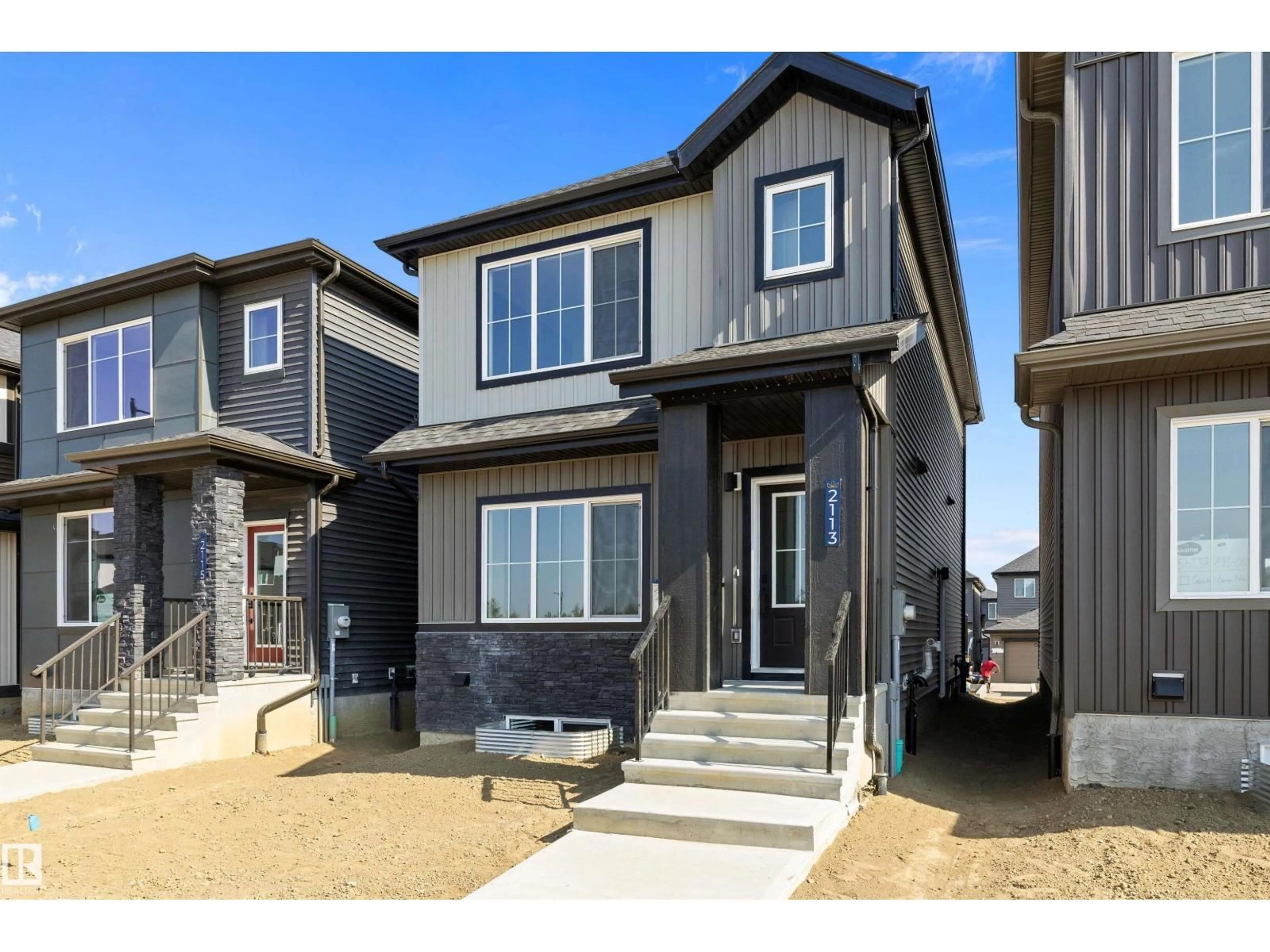Home with vinyl exterior material, street for 2113 CROSSBILL LN, Edmonton Alberta T5S0W3