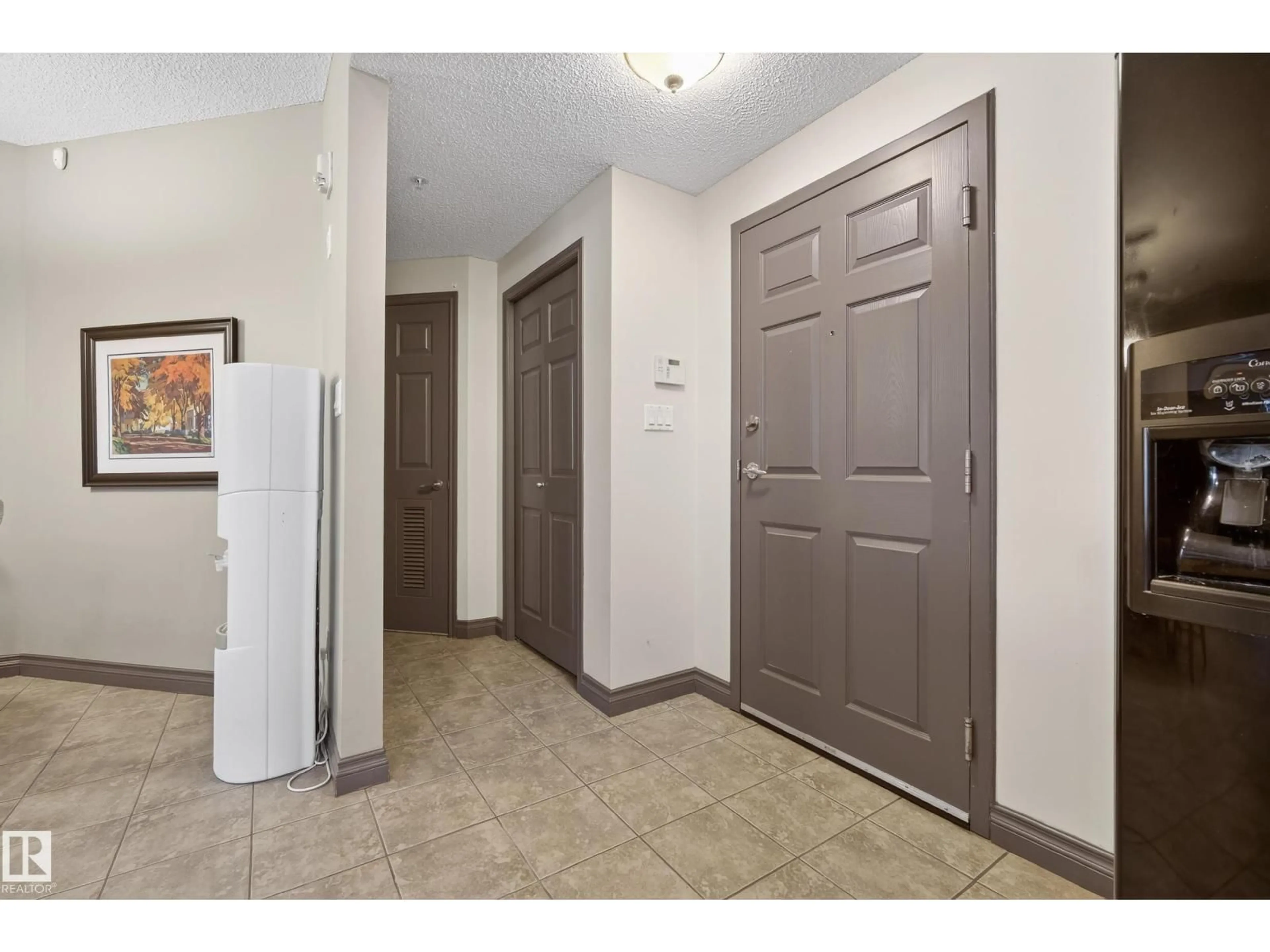 Indoor entryway for #102 - 9803 96A ST, Edmonton Alberta T6A4A5