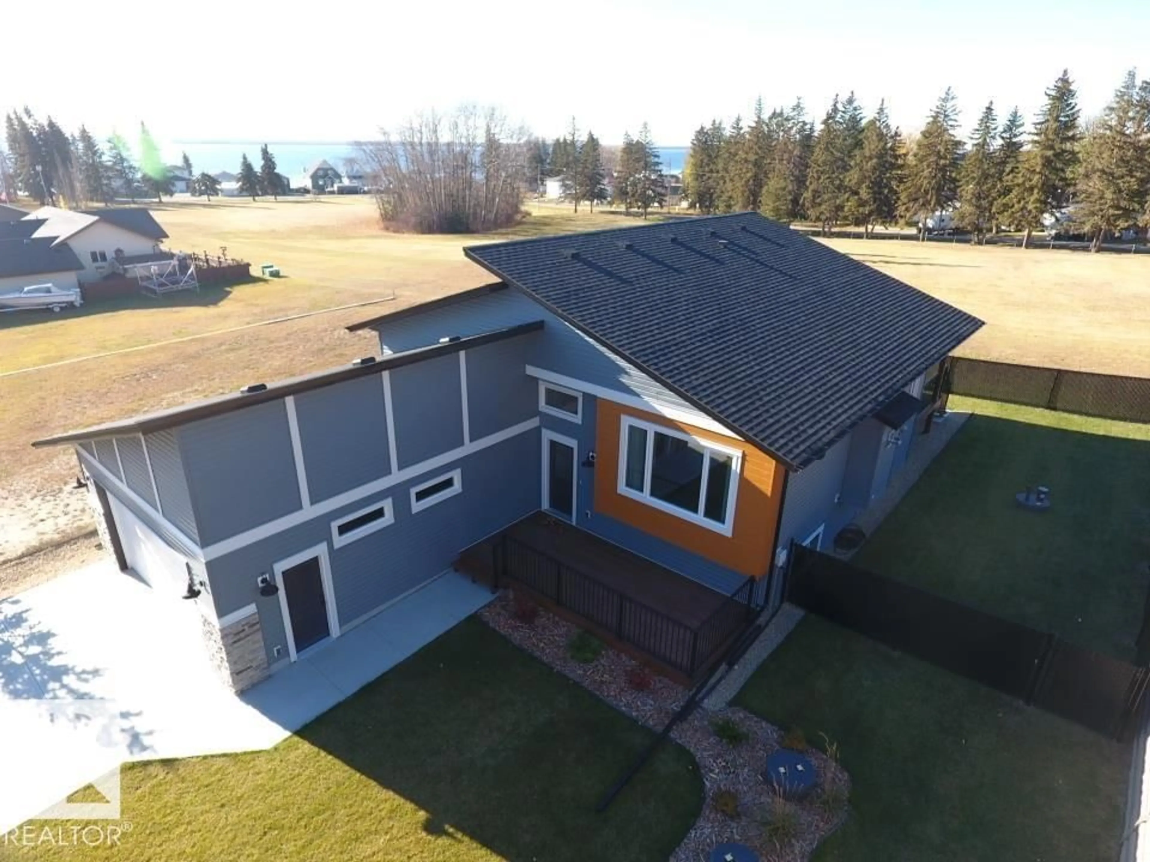 A pic from outside/outdoor area/front of a property/back of a property/a pic from drone, unknown for 102 1 ST, Rural Lac Ste. Anne County Alberta T0E1A0