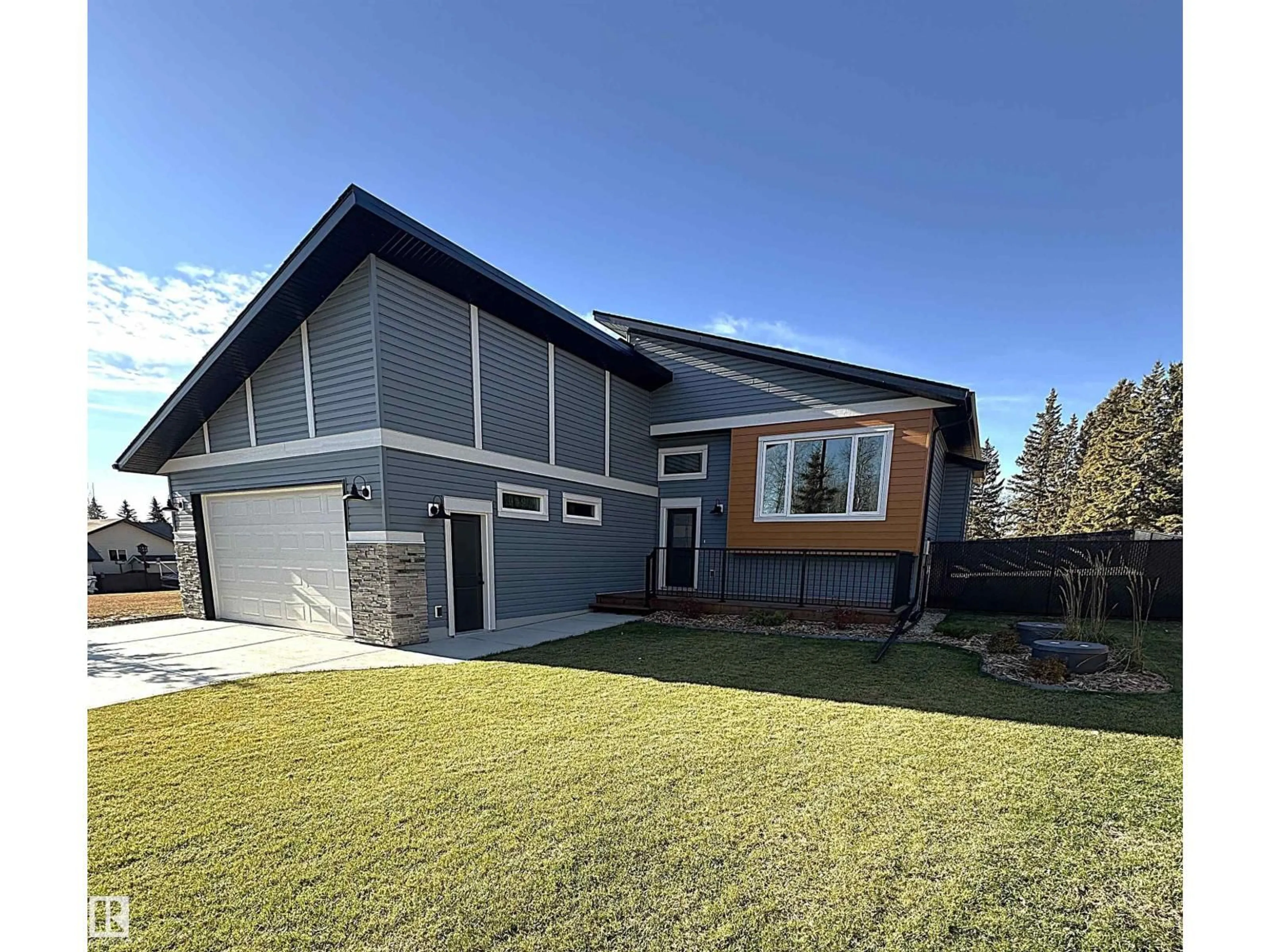 Home with vinyl exterior material, street for 102 1 ST, Rural Lac Ste. Anne County Alberta T0E1A0