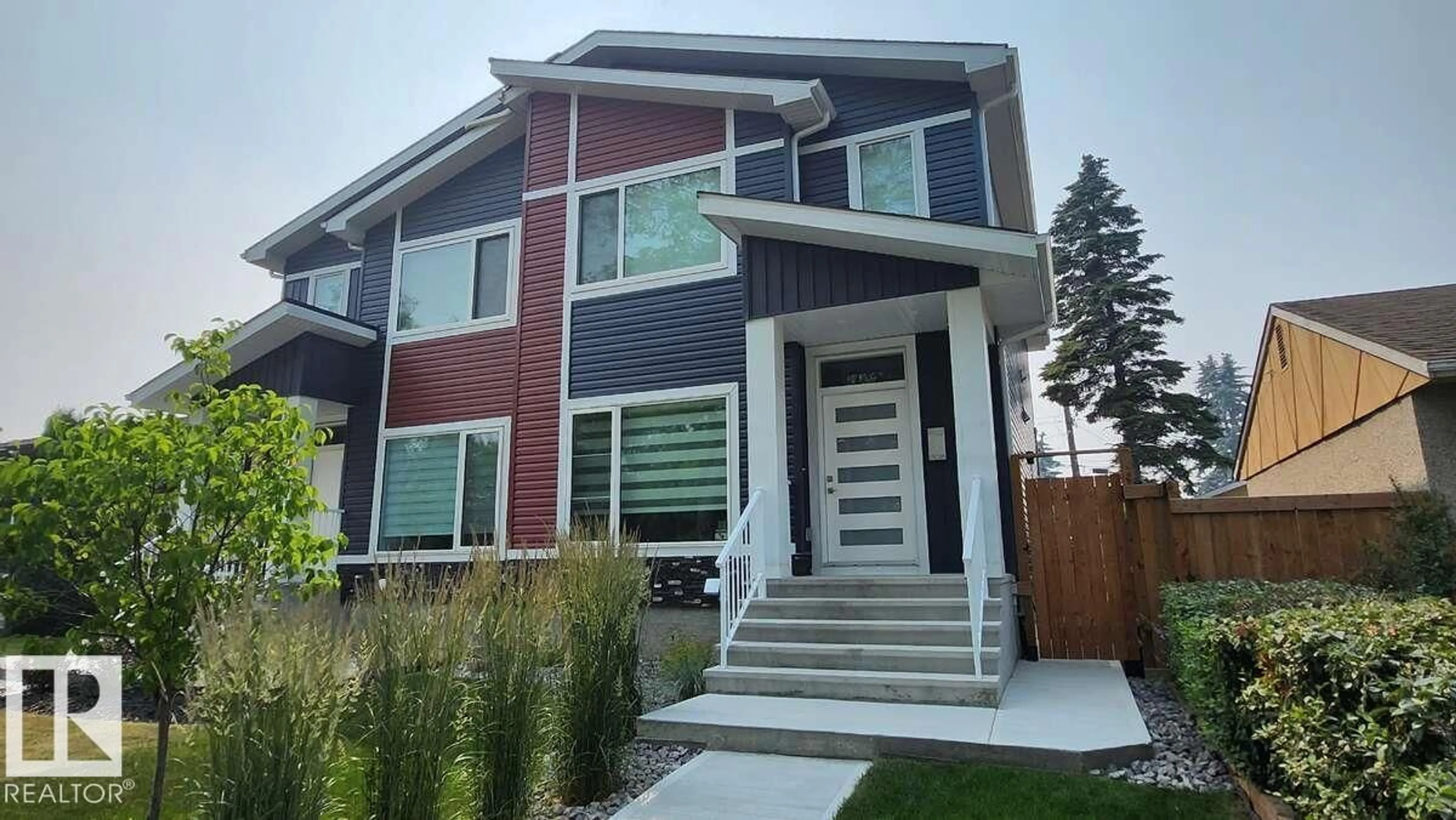 Home with vinyl exterior material, street for NW - 13026 120 ST, Edmonton Alberta T5E5N9