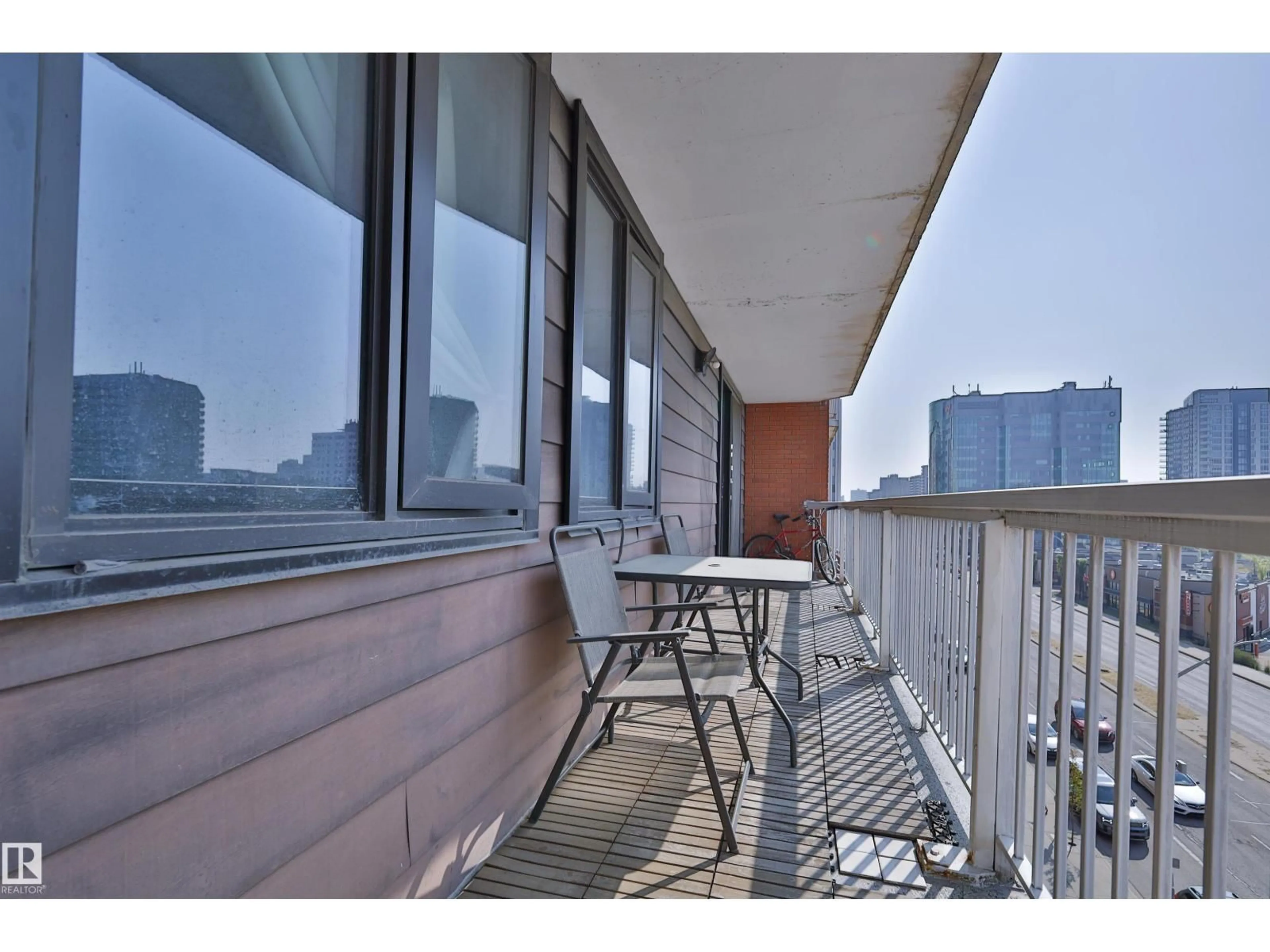 Balcony in the apartment, city buildings view from balcony for #505 - 10175 109 ST, Edmonton Alberta T5J3P2