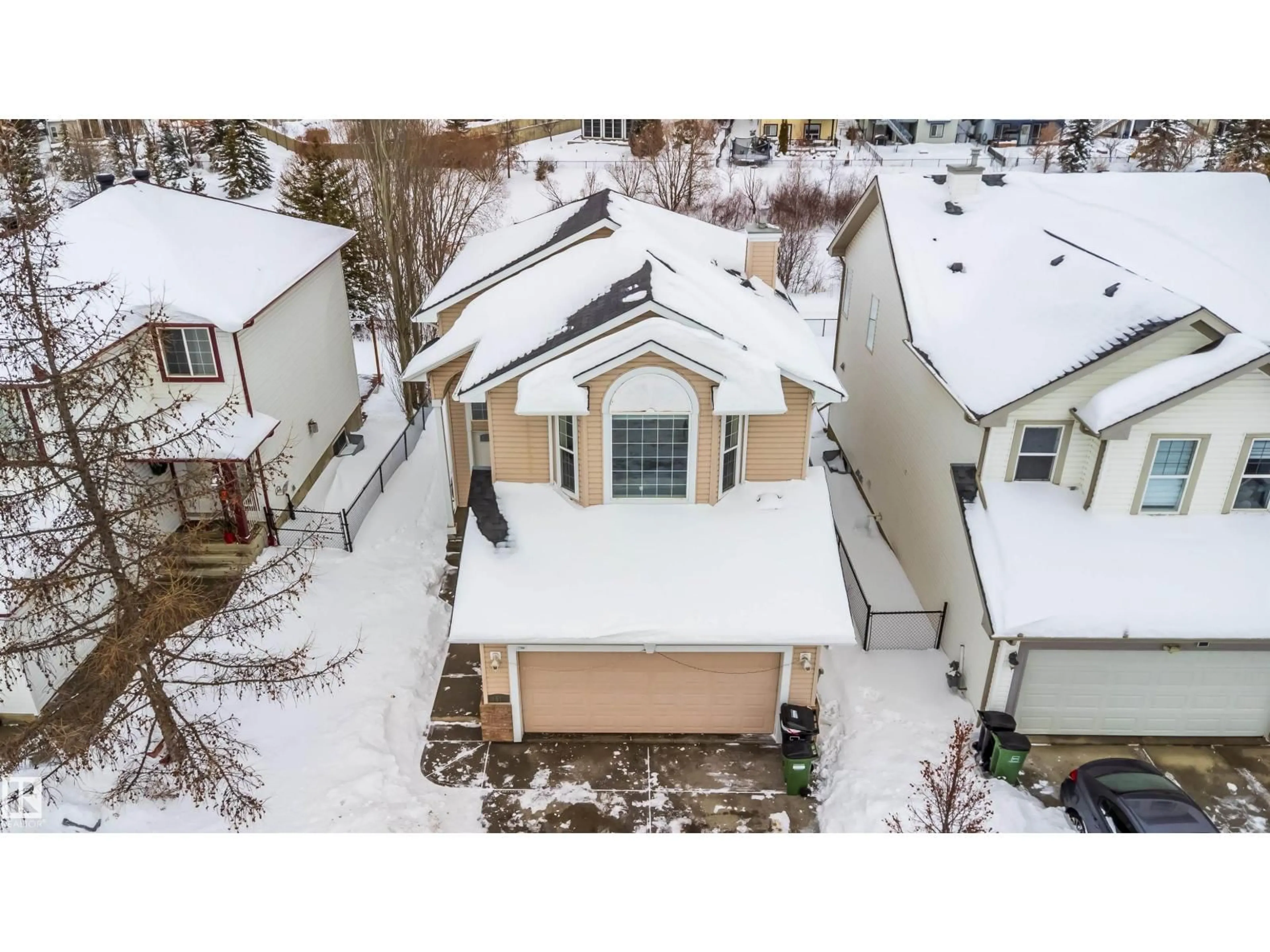 A pic from outside/outdoor area/front of a property/back of a property/a pic from drone, street for 8518 6 AV SW, Edmonton Alberta T6X1J1