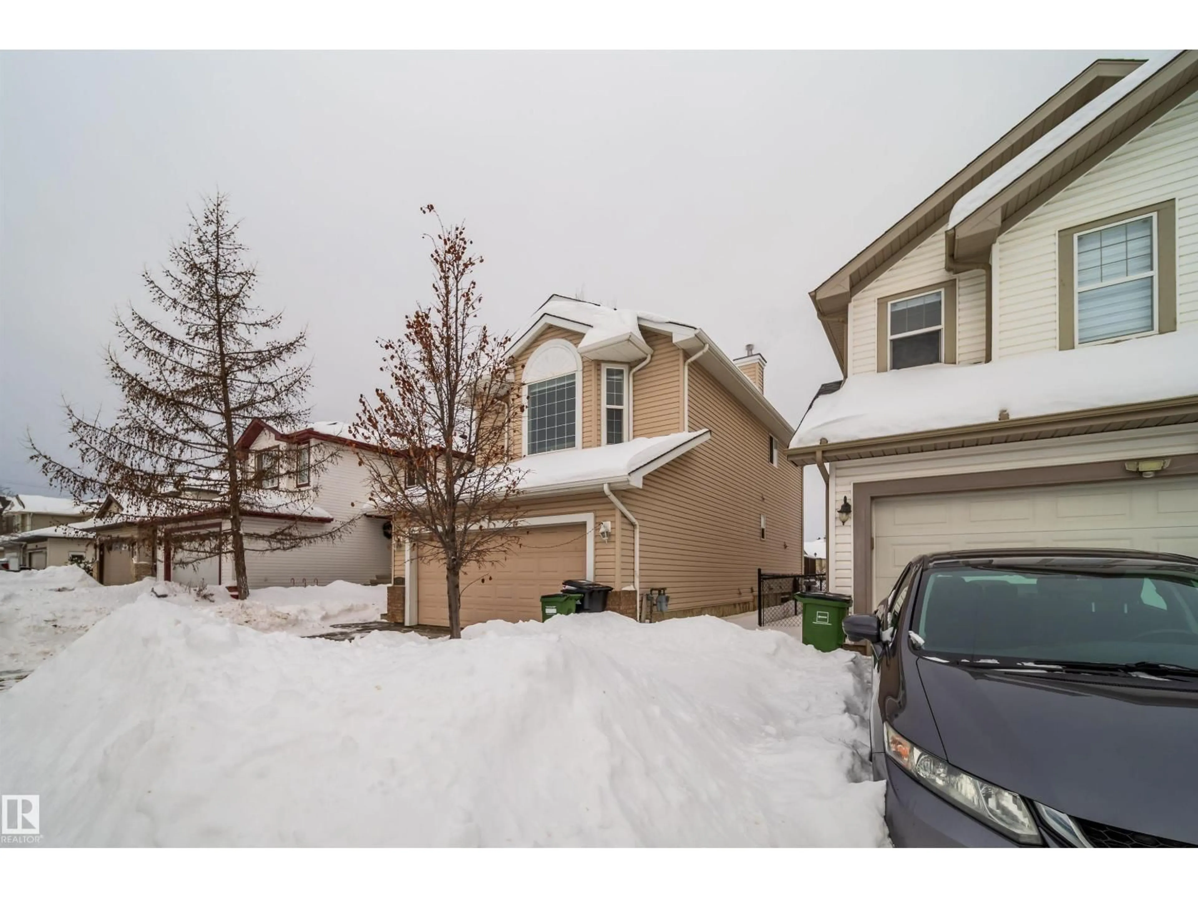 A pic from outside/outdoor area/front of a property/back of a property/a pic from drone, street for 8518 6 AV SW, Edmonton Alberta T6X1J1