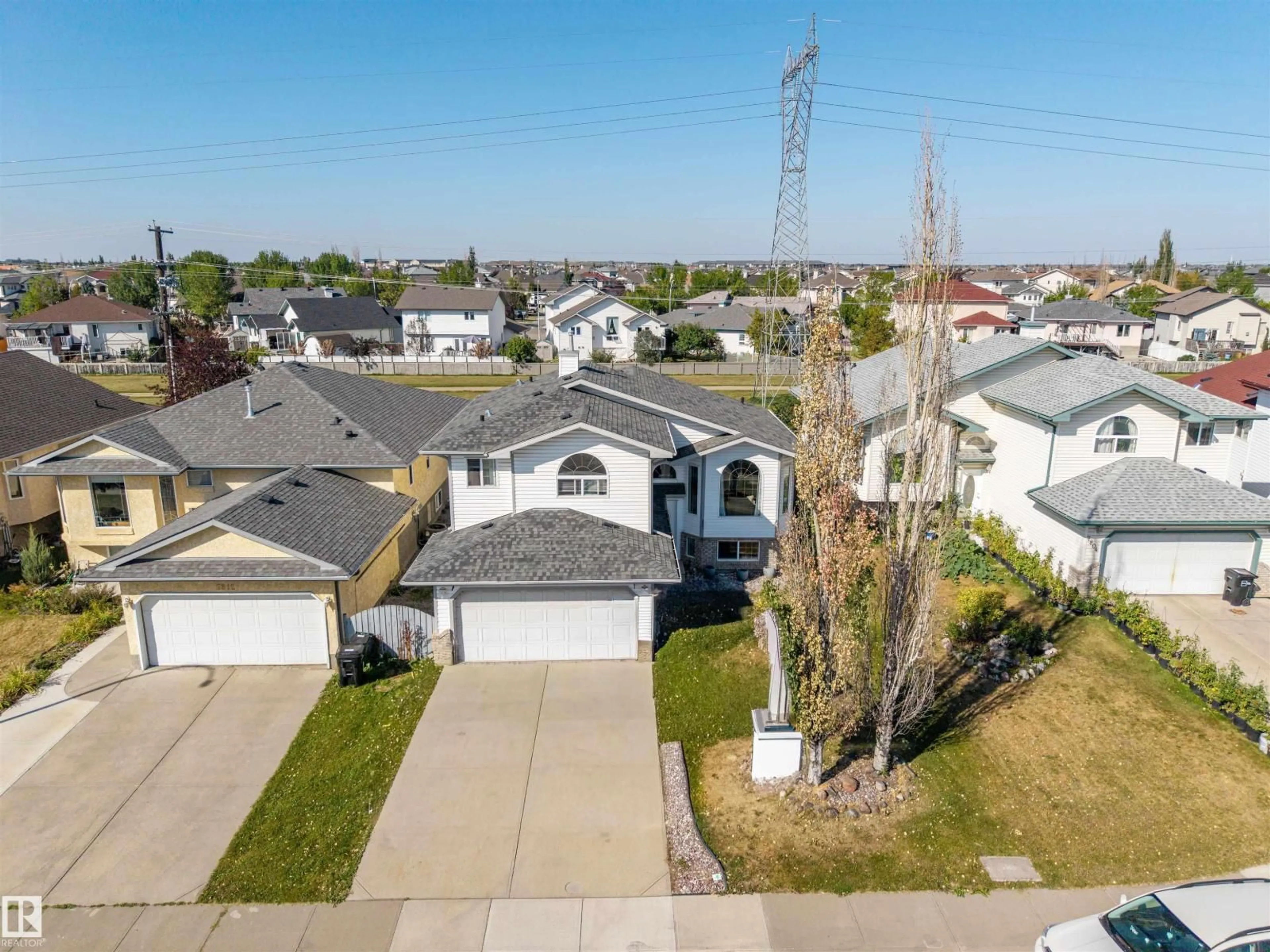 A pic from outside/outdoor area/front of a property/back of a property/a pic from drone, street for 7808 163 AV, Edmonton Alberta T5Z3K8