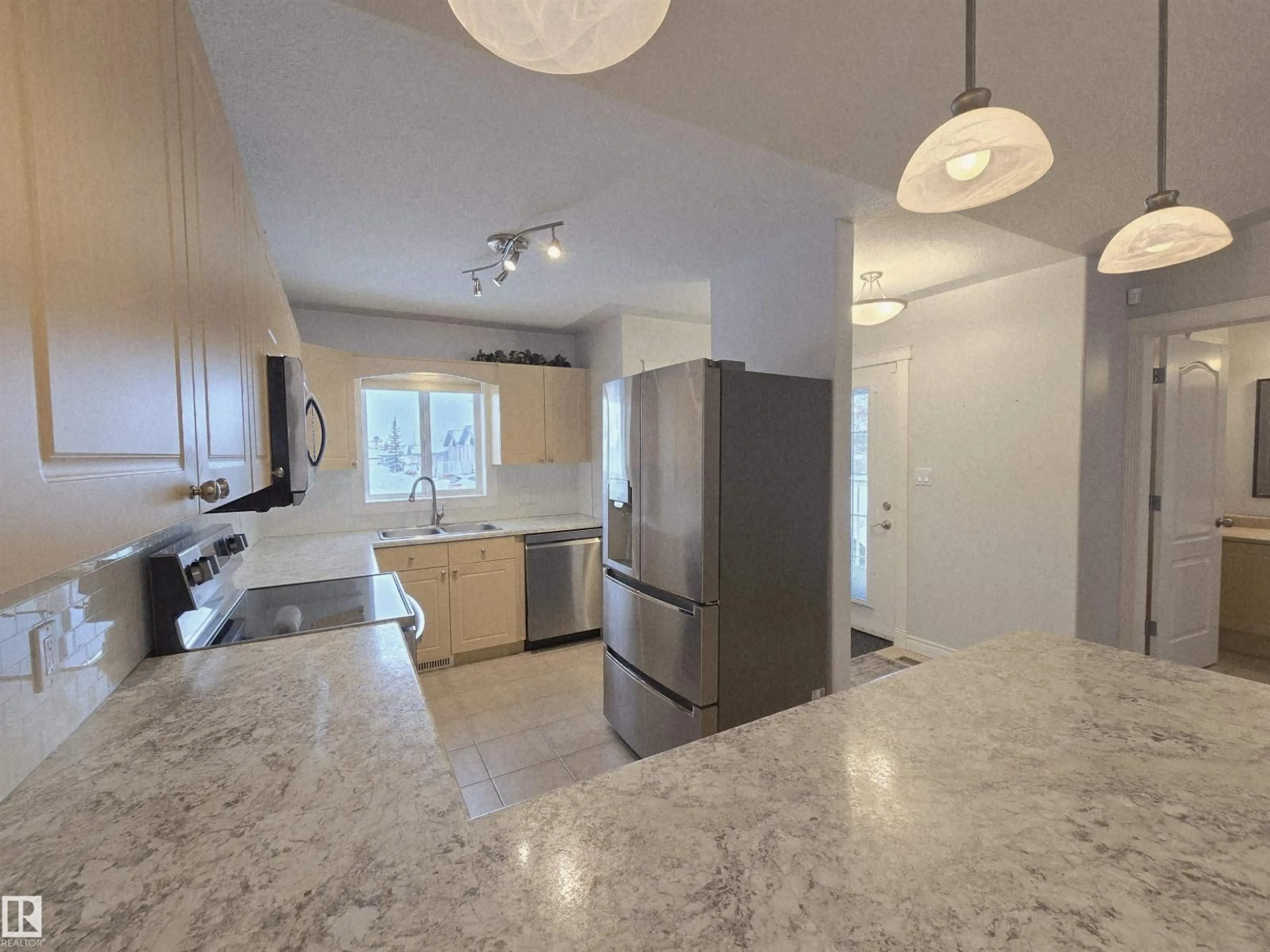 Open concept kitchen, ceramic/tile floor for 3 - 34 SPRUCE RIDGE DR, Spruce Grove Alberta T7X4N3