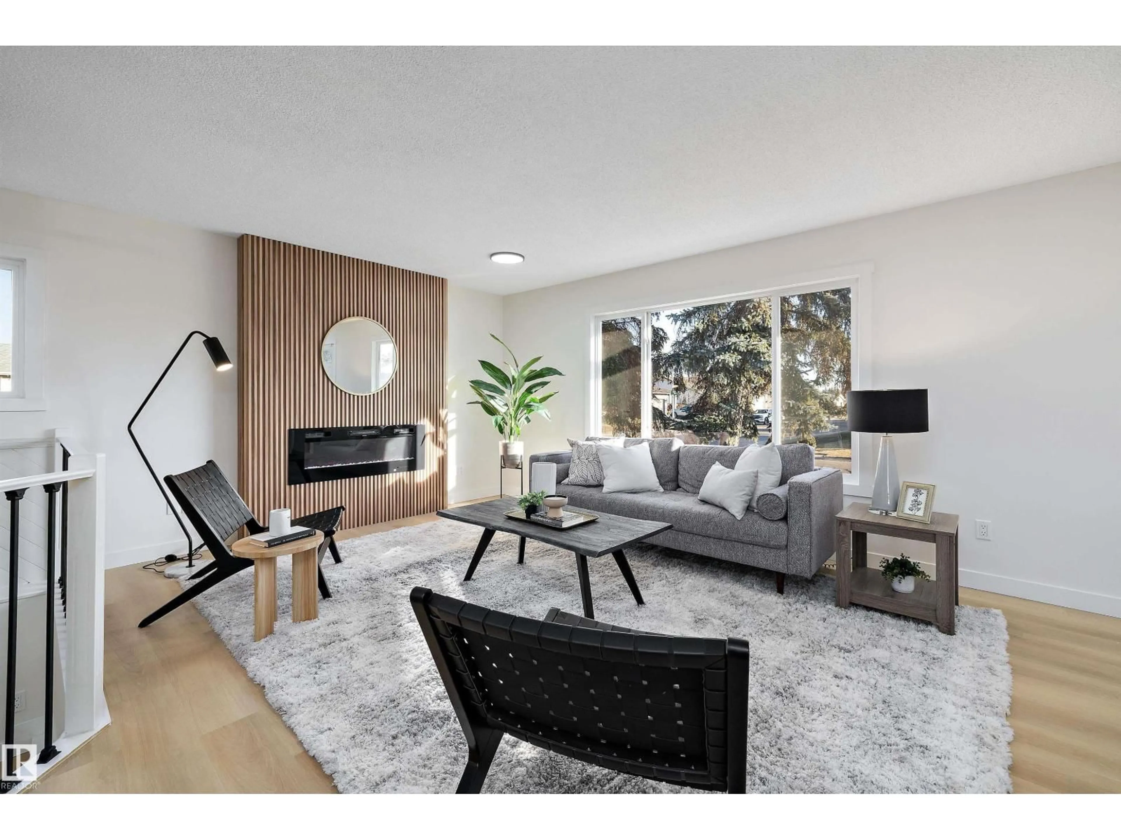 Living room with furniture, unknown for 14736 122 ST, Edmonton Alberta T5X1V9