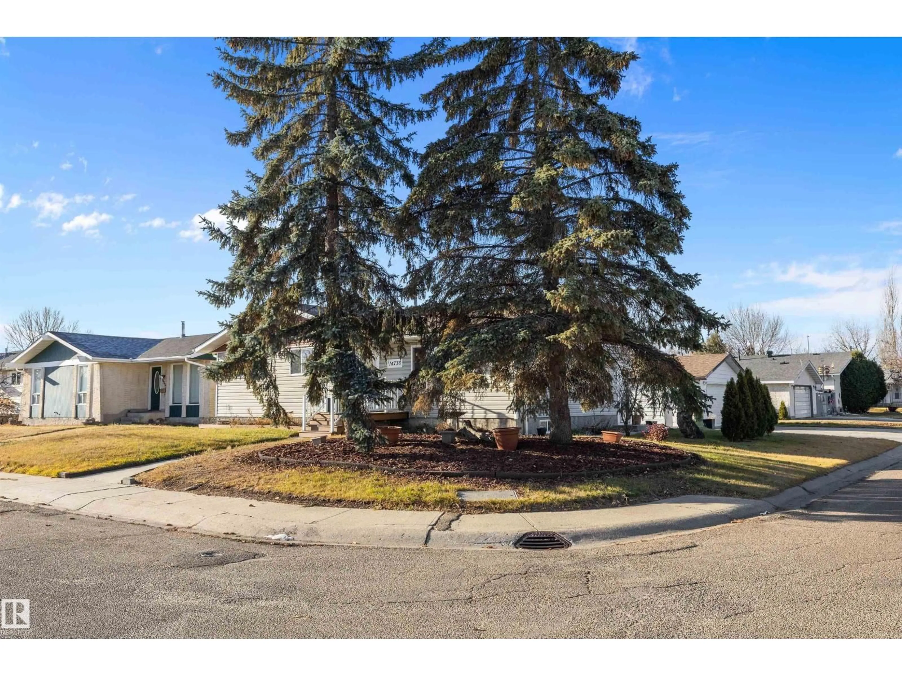 A pic from outside/outdoor area/front of a property/back of a property/a pic from drone, street for 14736 122 ST, Edmonton Alberta T5X1V9