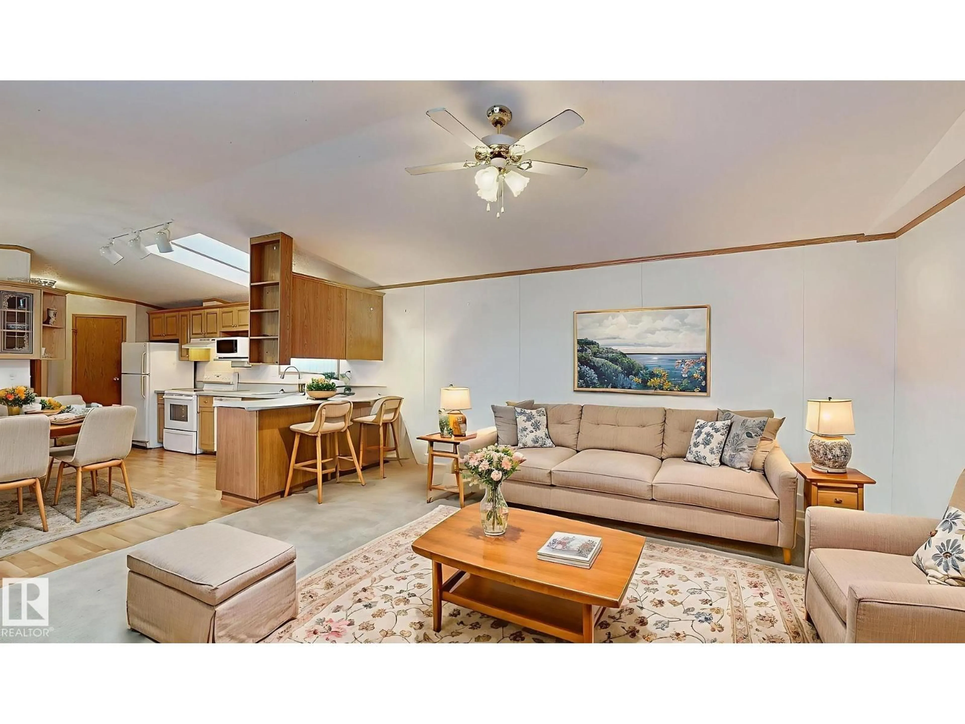 Living room with furniture, wood/laminate floor for 2925 LAKEWOOD DR, Edmonton Alberta T5S1T7