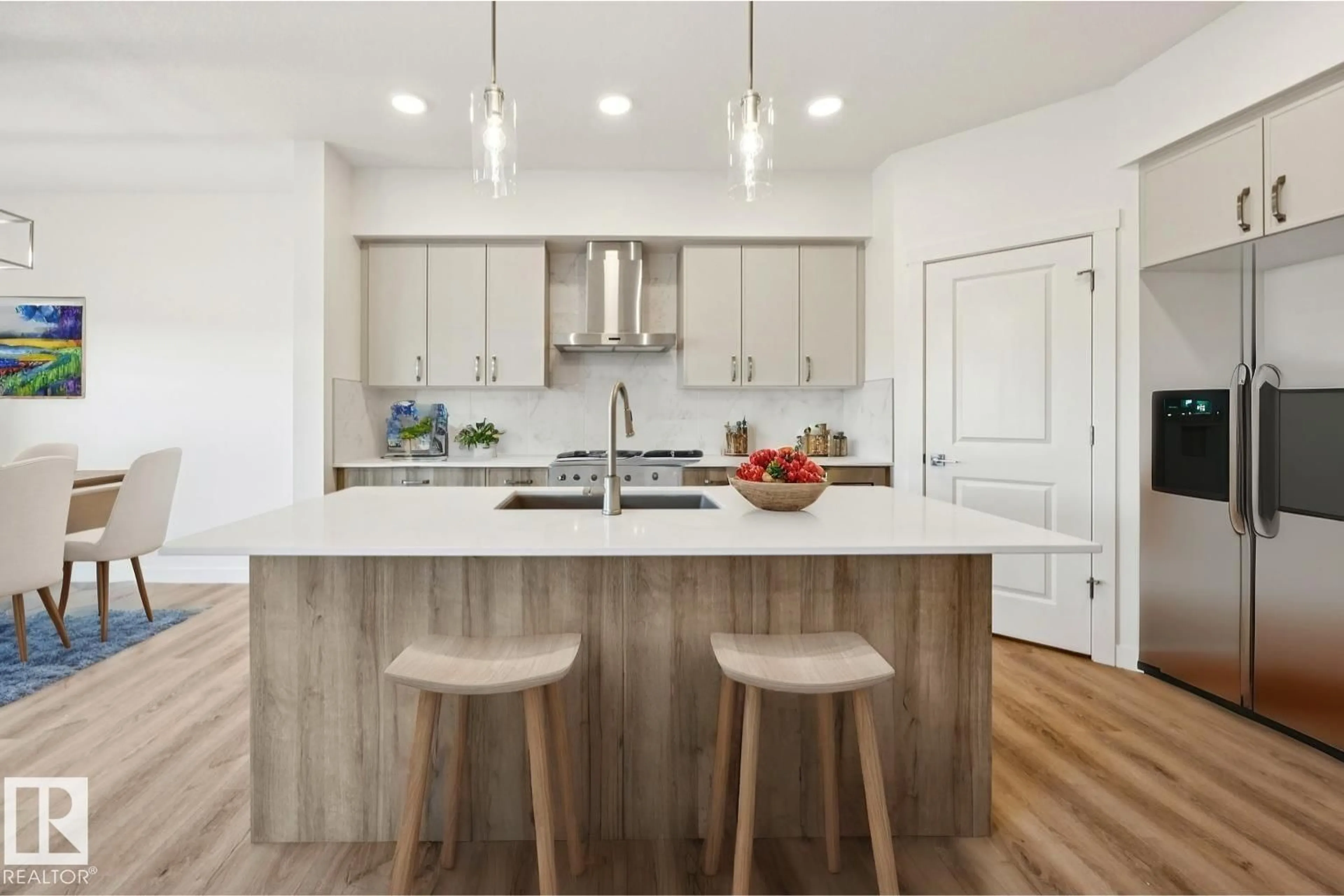 Open concept kitchen, wood/laminate floor for NW - 2828 191 ST, Edmonton Alberta T6M3C3