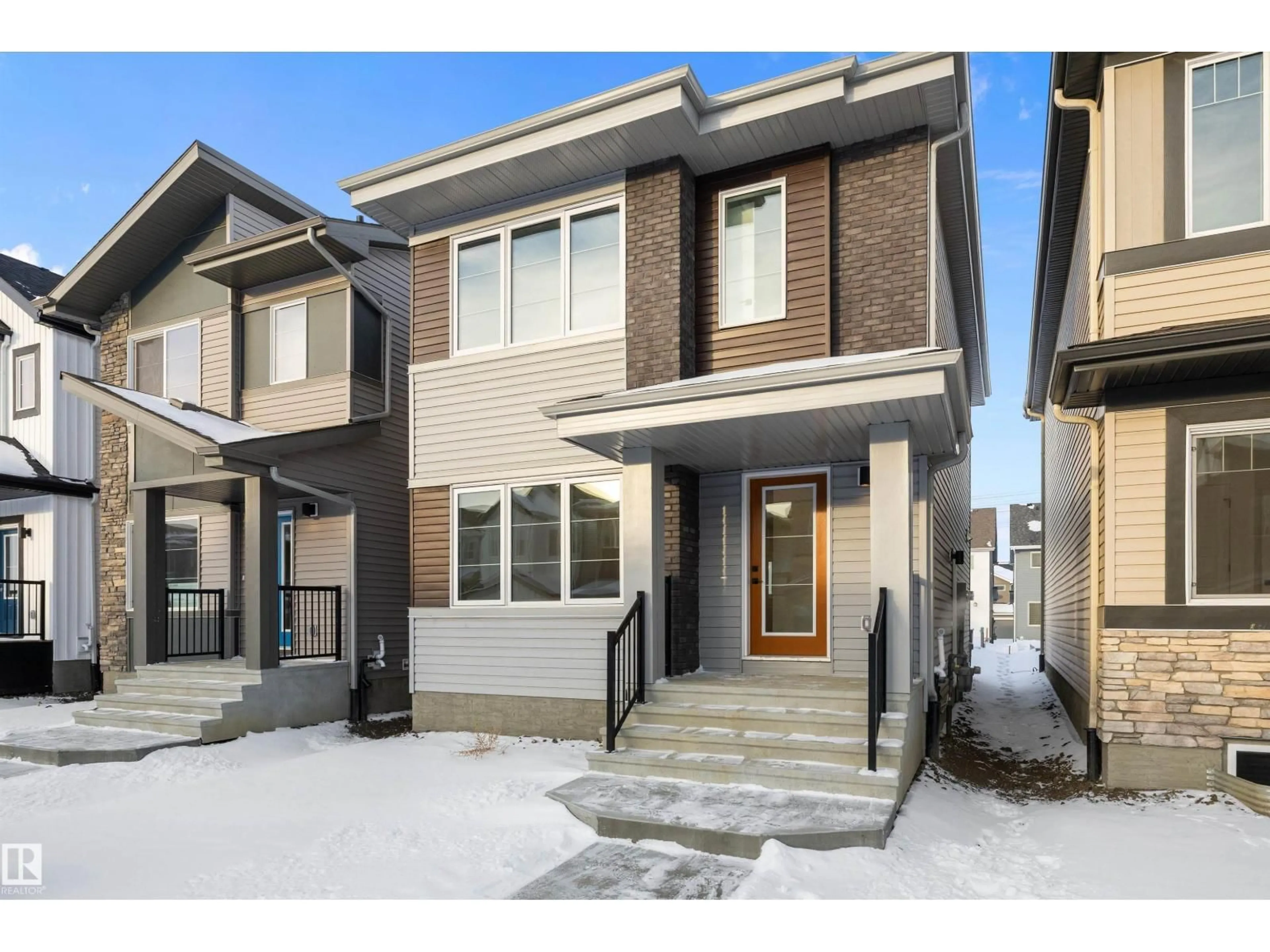 Home with brick exterior material, street for NW - 18924 28 AV, Edmonton Alberta T6M3H9