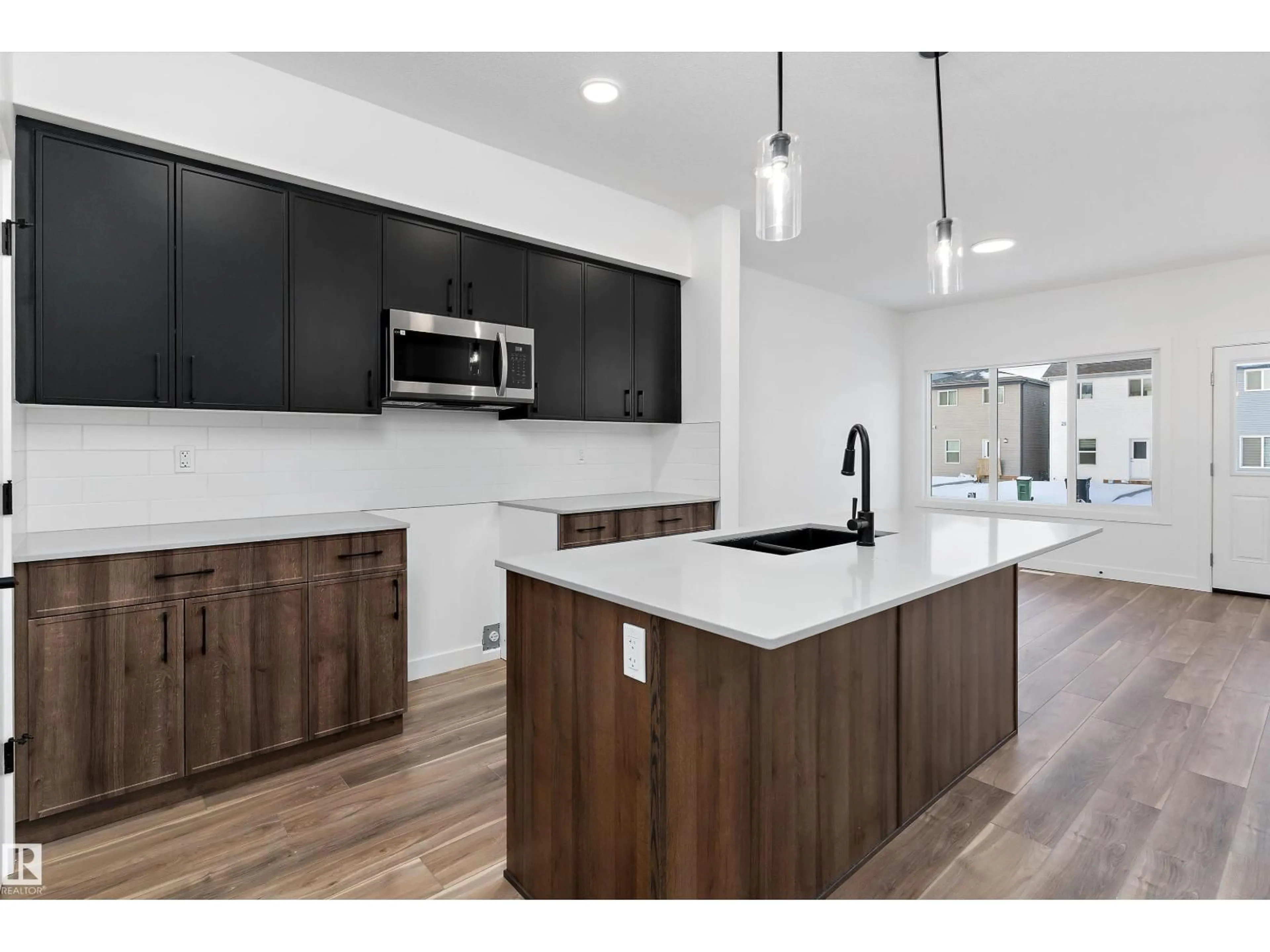 Open concept kitchen, unknown for 18920 28 AV, Edmonton Alberta T6M3H9