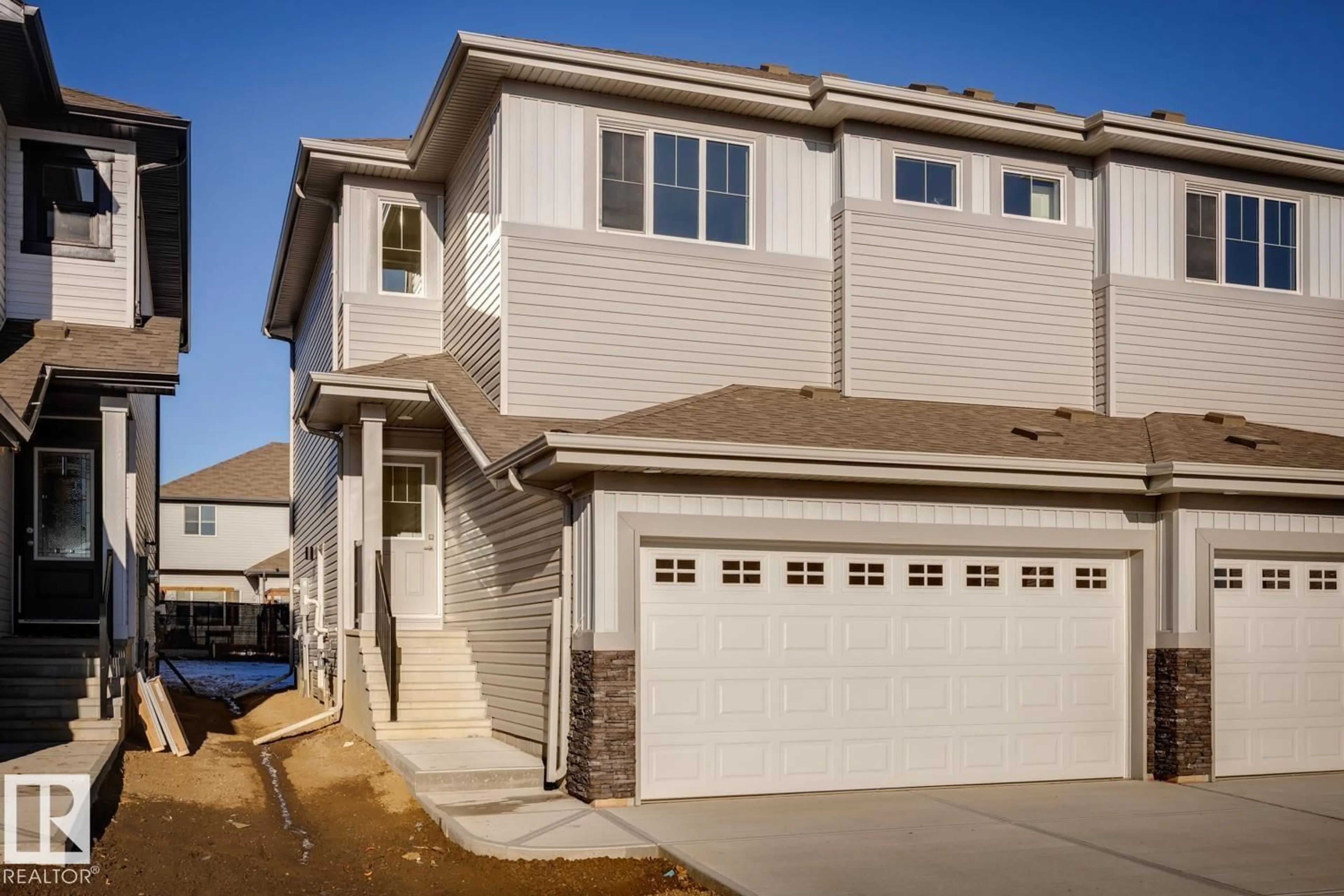 Home with vinyl exterior material, street for 1146 SOUTH CREEK WD, Stony Plain Alberta T7Z0M1