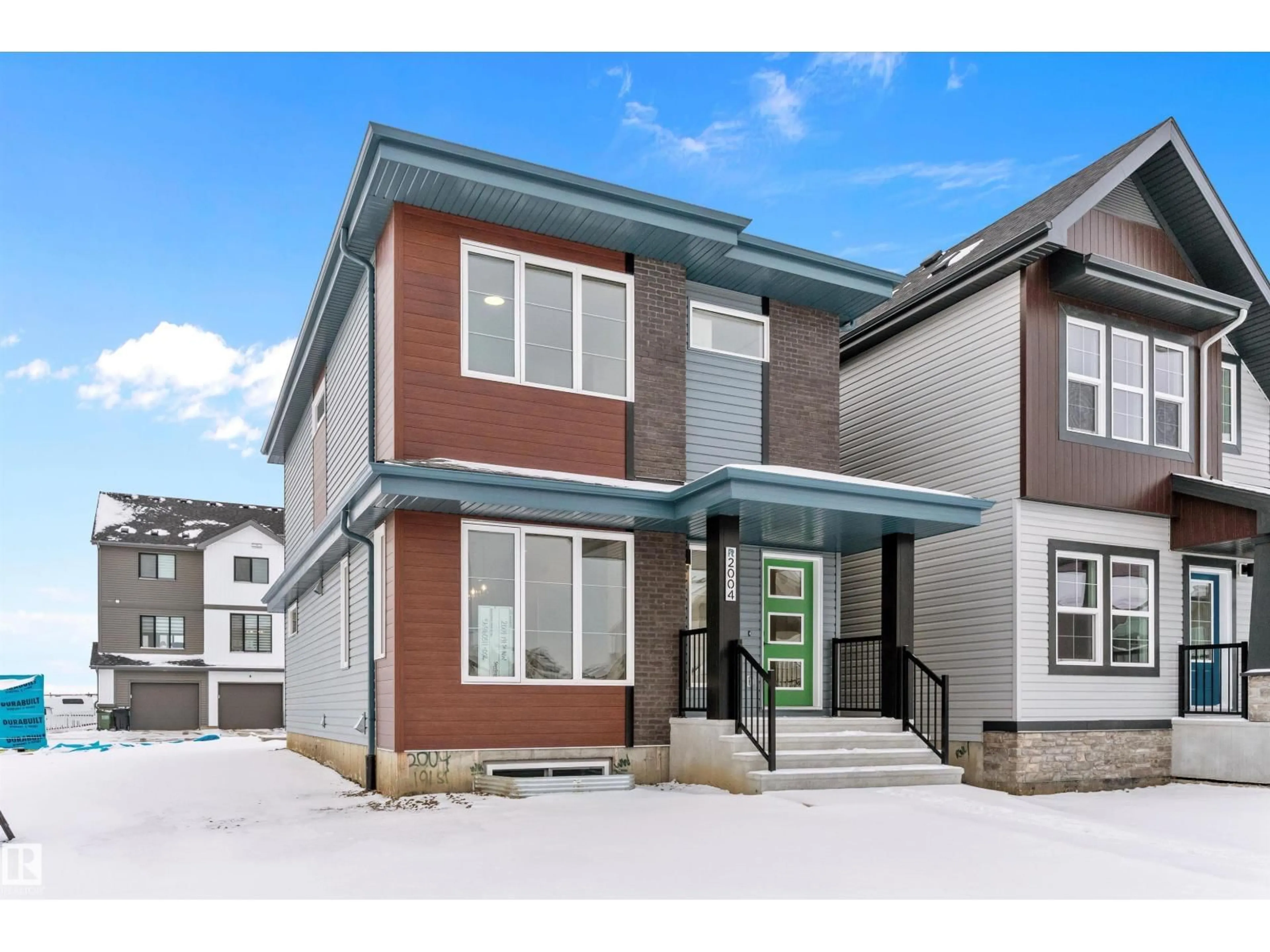 Home with vinyl exterior material, street for 2004 191 ST, Edmonton Alberta T6M3E8