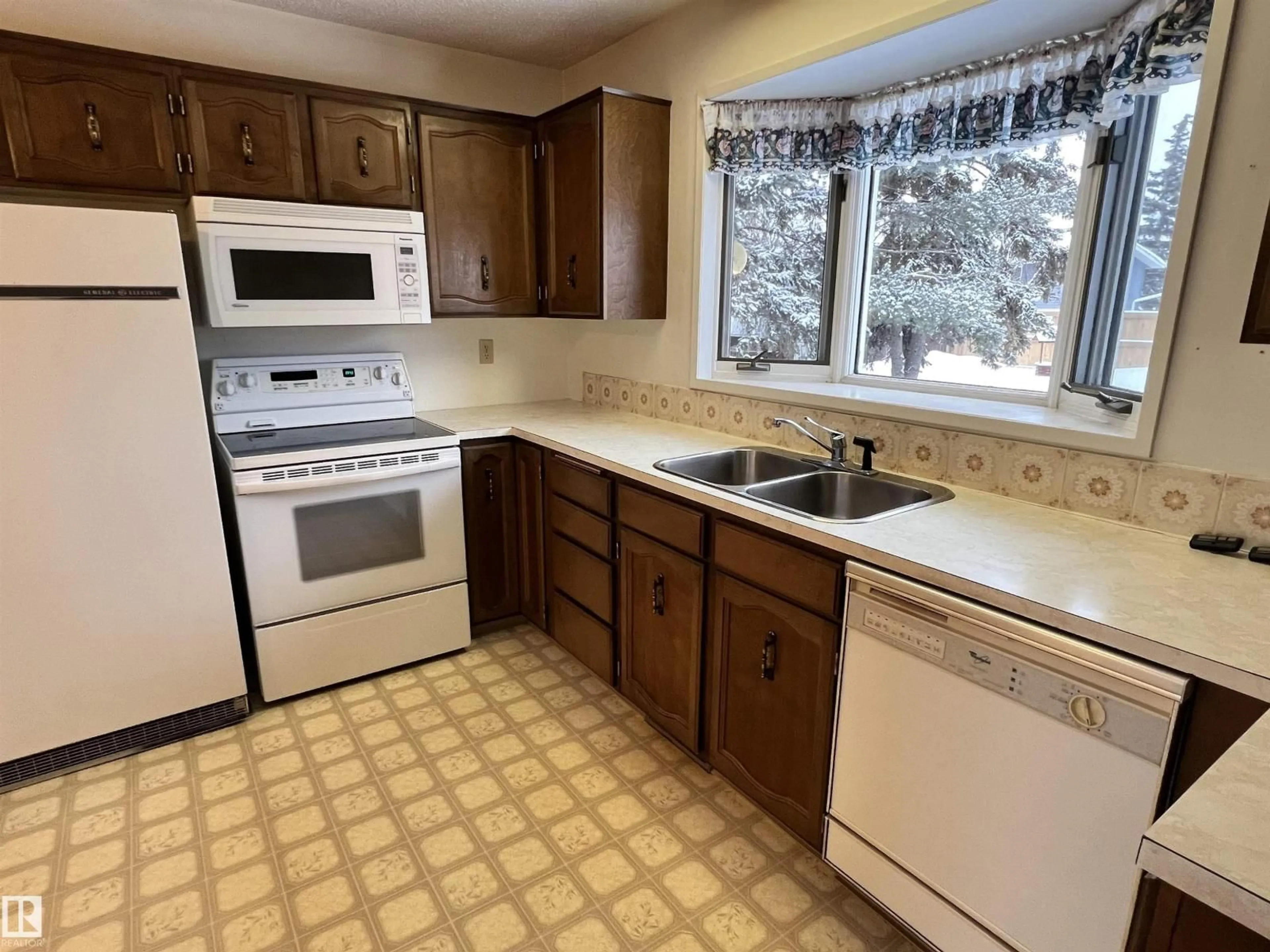 Standard kitchen, ceramic/tile floor for 9303 99A AV, Morinville Alberta T8R1J6