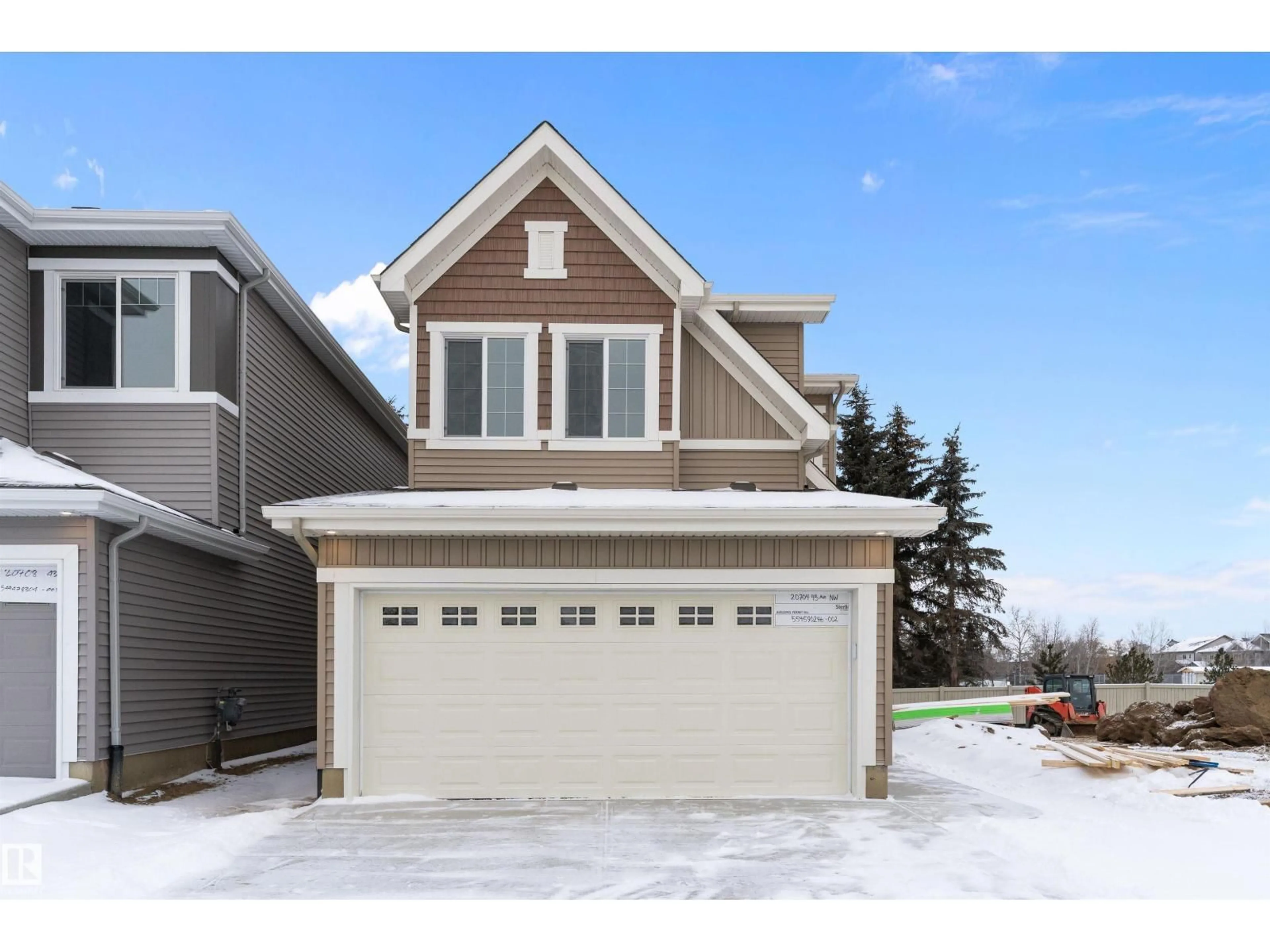 Home with vinyl exterior material, street for 20704 43 AV, Edmonton Alberta T6M3E4