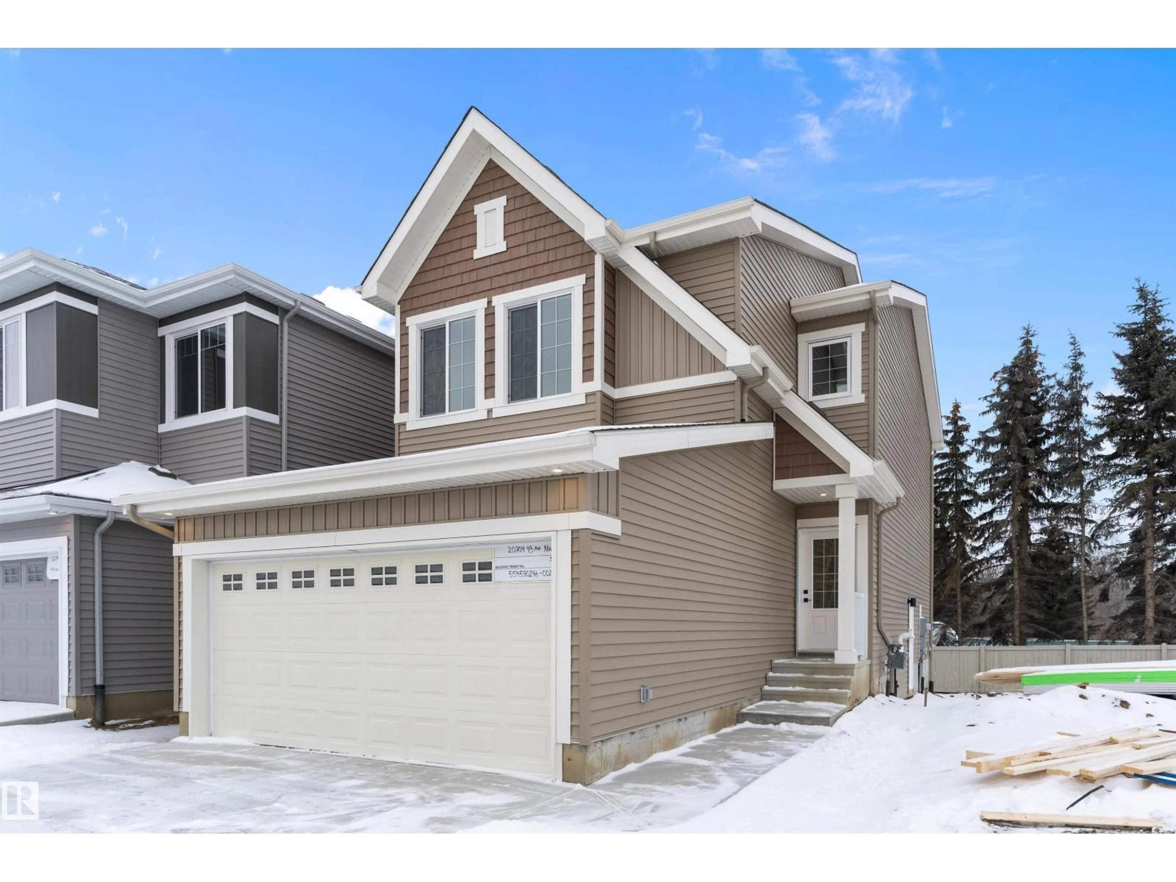 Home with vinyl exterior material, street for 20704 43 AV, Edmonton Alberta T6M3E4