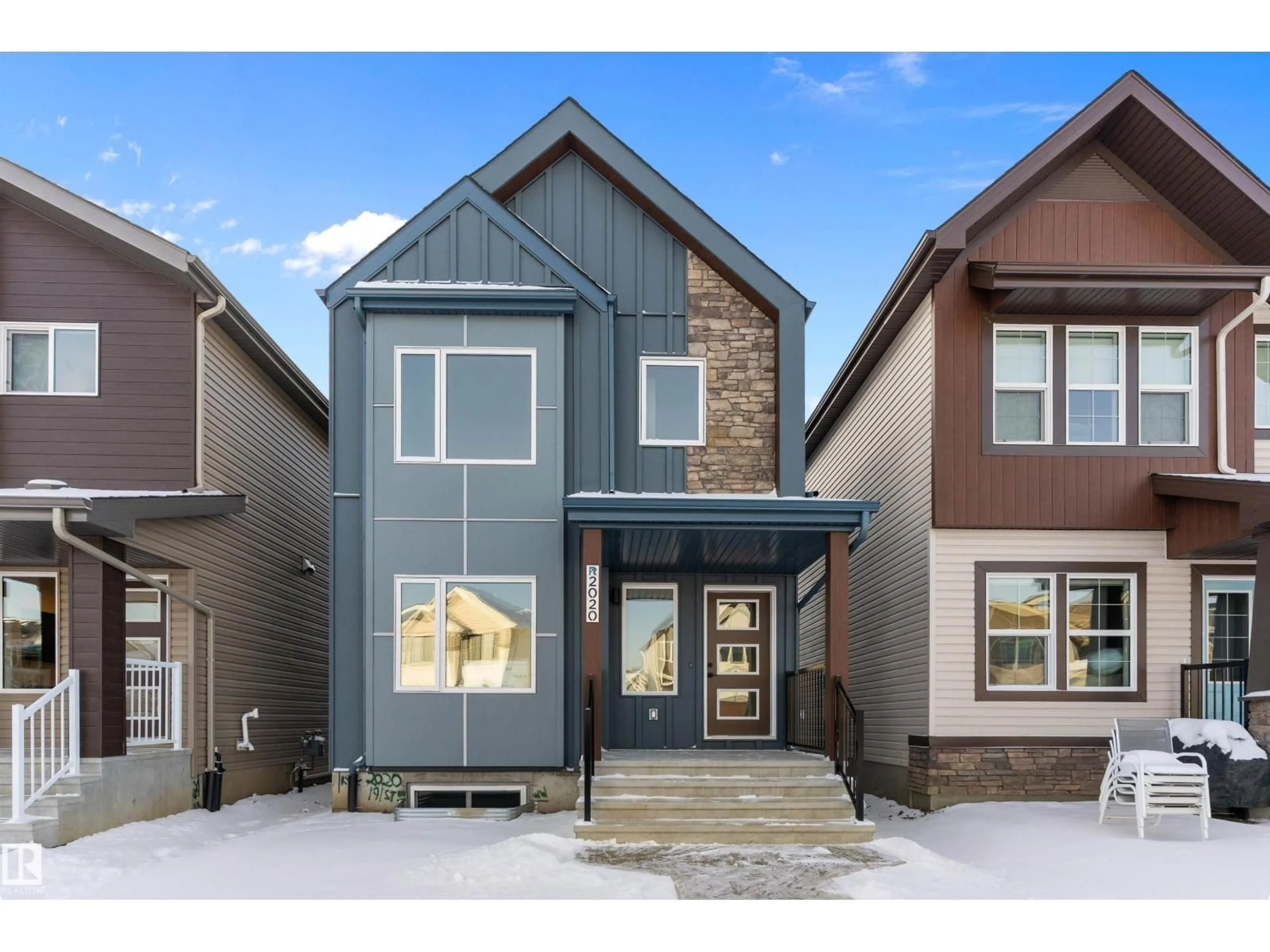Home with brick exterior material, street for NW - 2020 191 ST, Edmonton Alberta T6M3E8