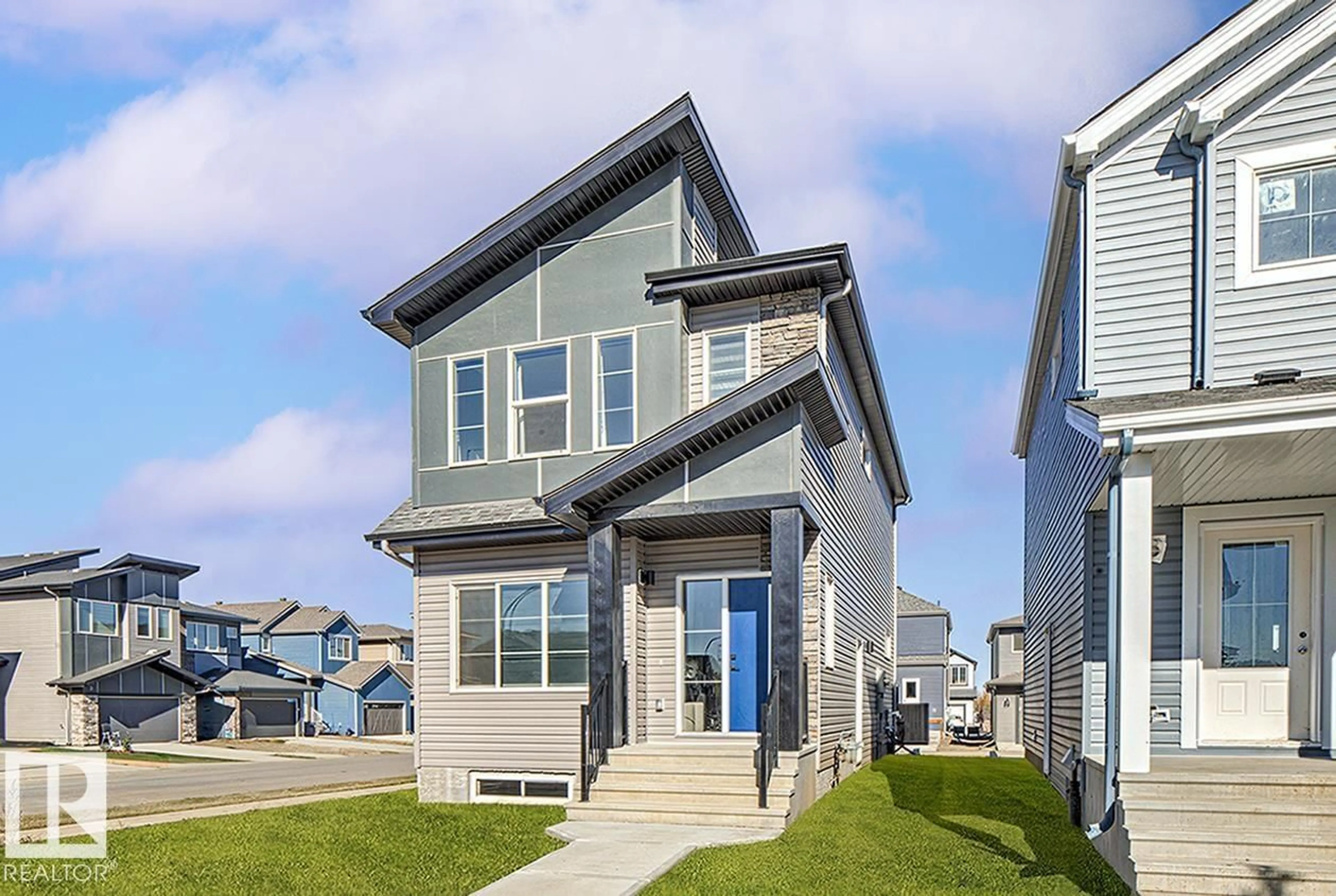 Home with vinyl exterior material, street for 1214 MCLEOD AVENUE, Spruce Grove Alberta T7X4B7