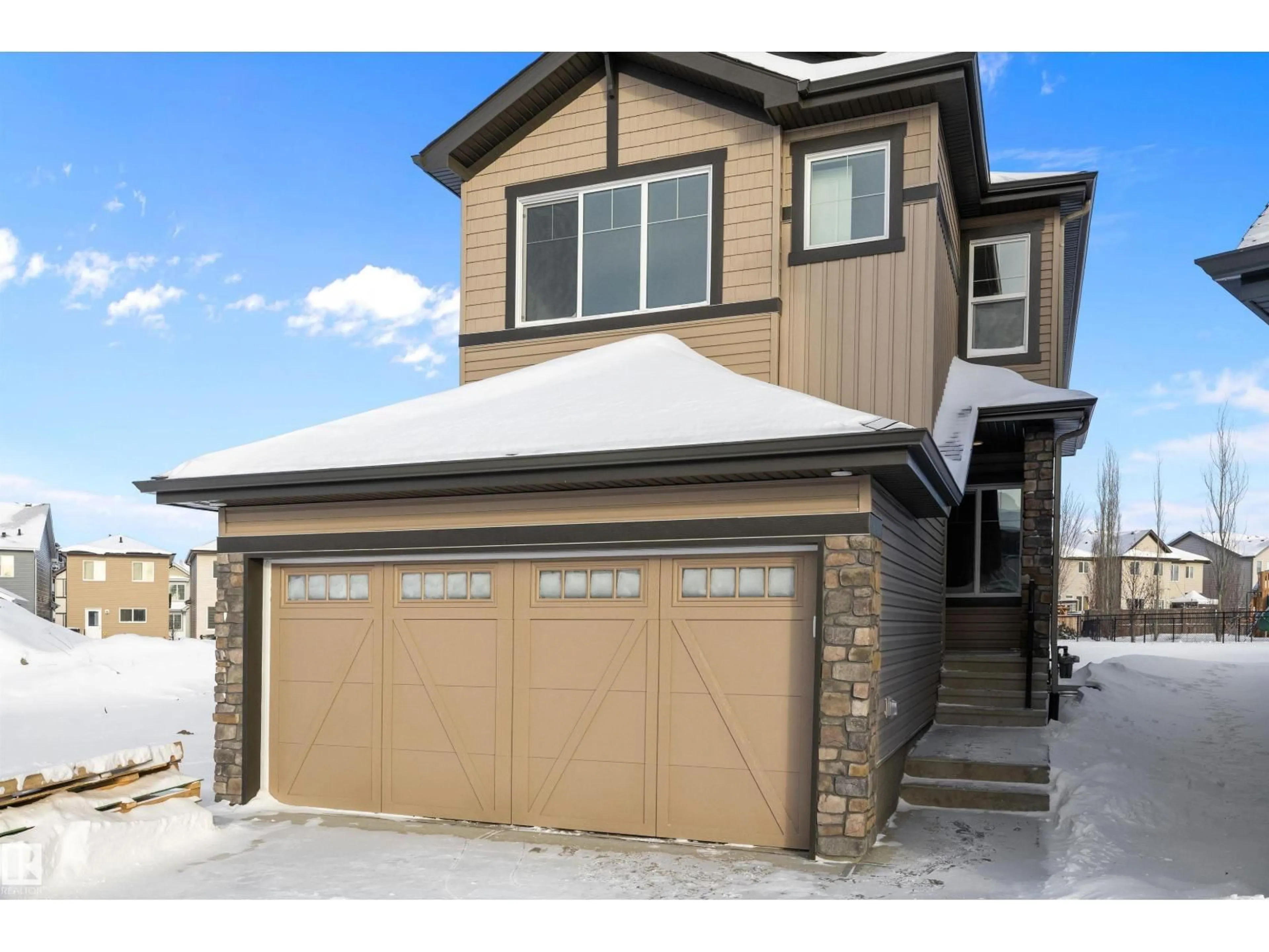 Home with vinyl exterior material, street for NW - 17553 62A ST, Edmonton Alberta T5Y4H3