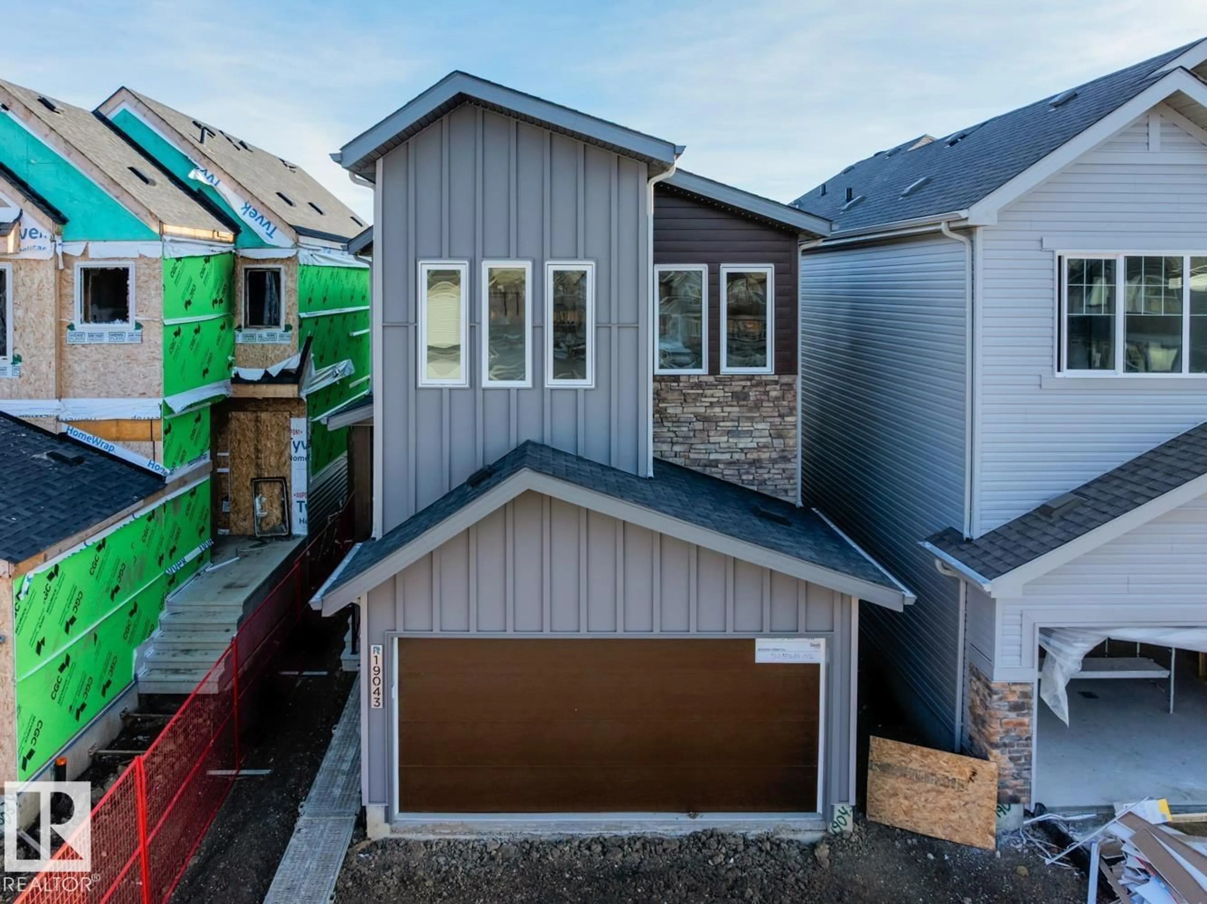 Home with vinyl exterior material, street for NW - 19043 20 AV, Edmonton Alberta T6M3E8