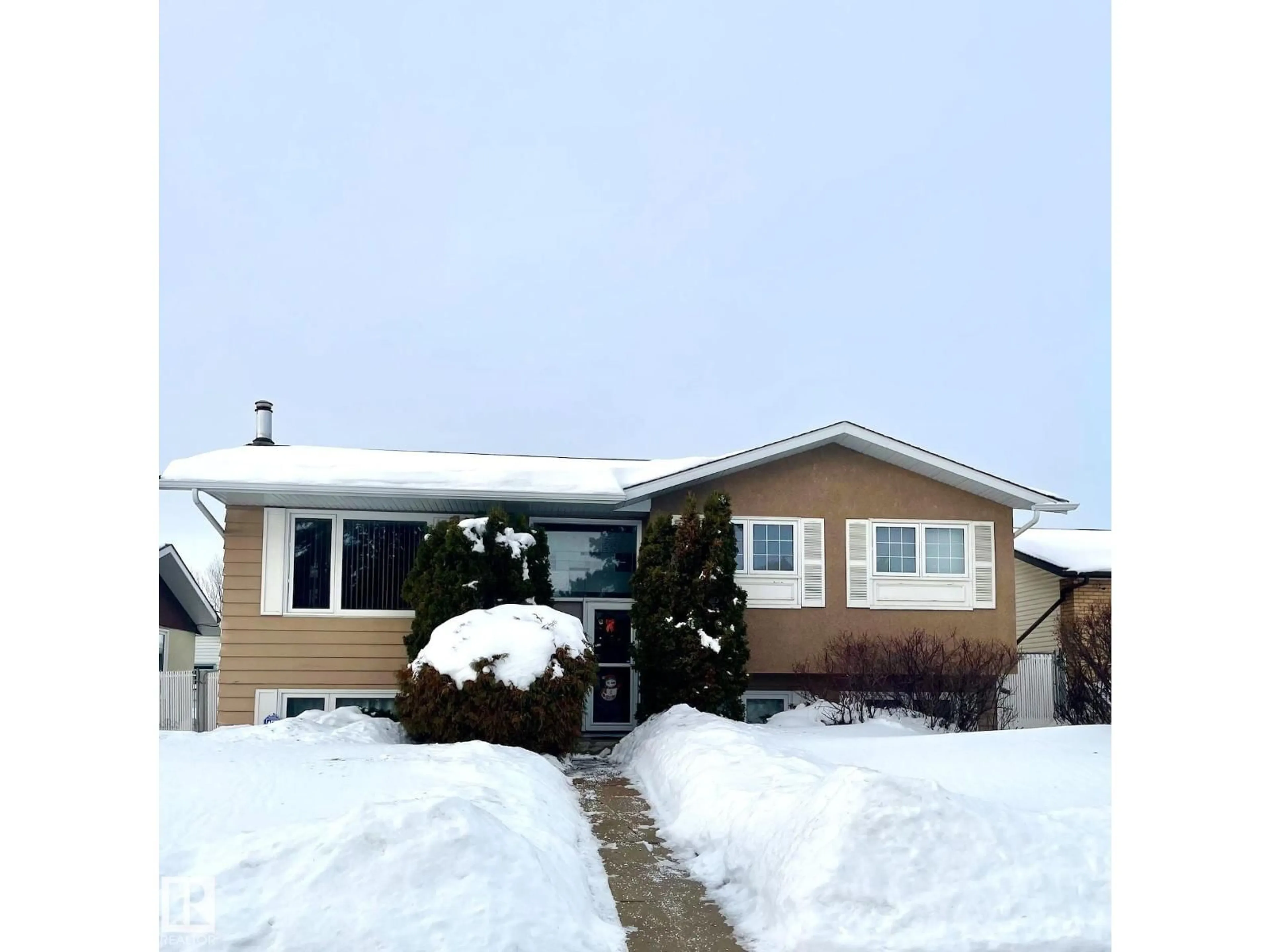 Home with vinyl exterior material, street for 14936 81 ST, Edmonton Alberta T5P1P5