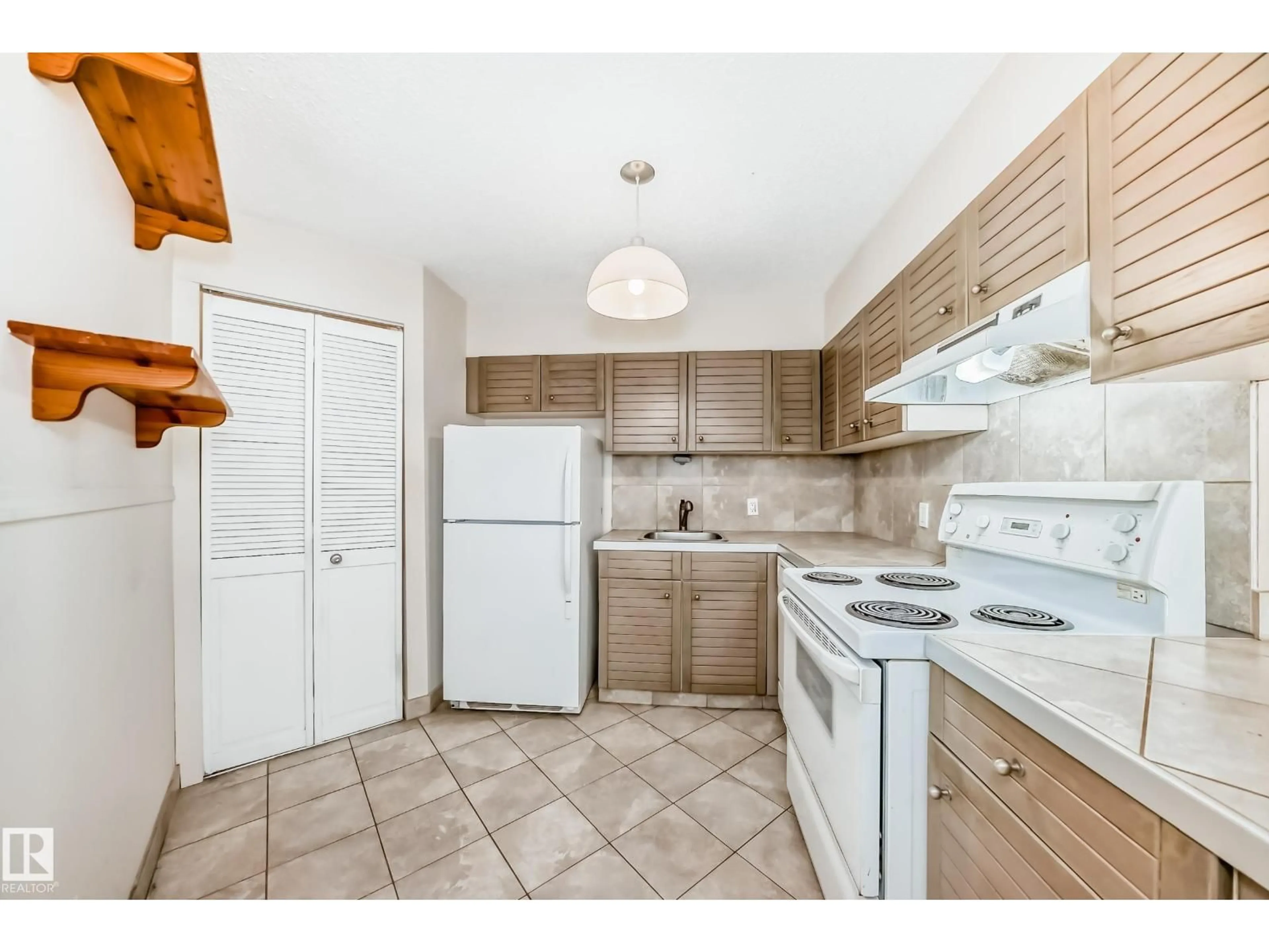 Standard kitchen, unknown for #208 - 10149 SASKATCHEWAN DR, Edmonton Alberta T6E6B6