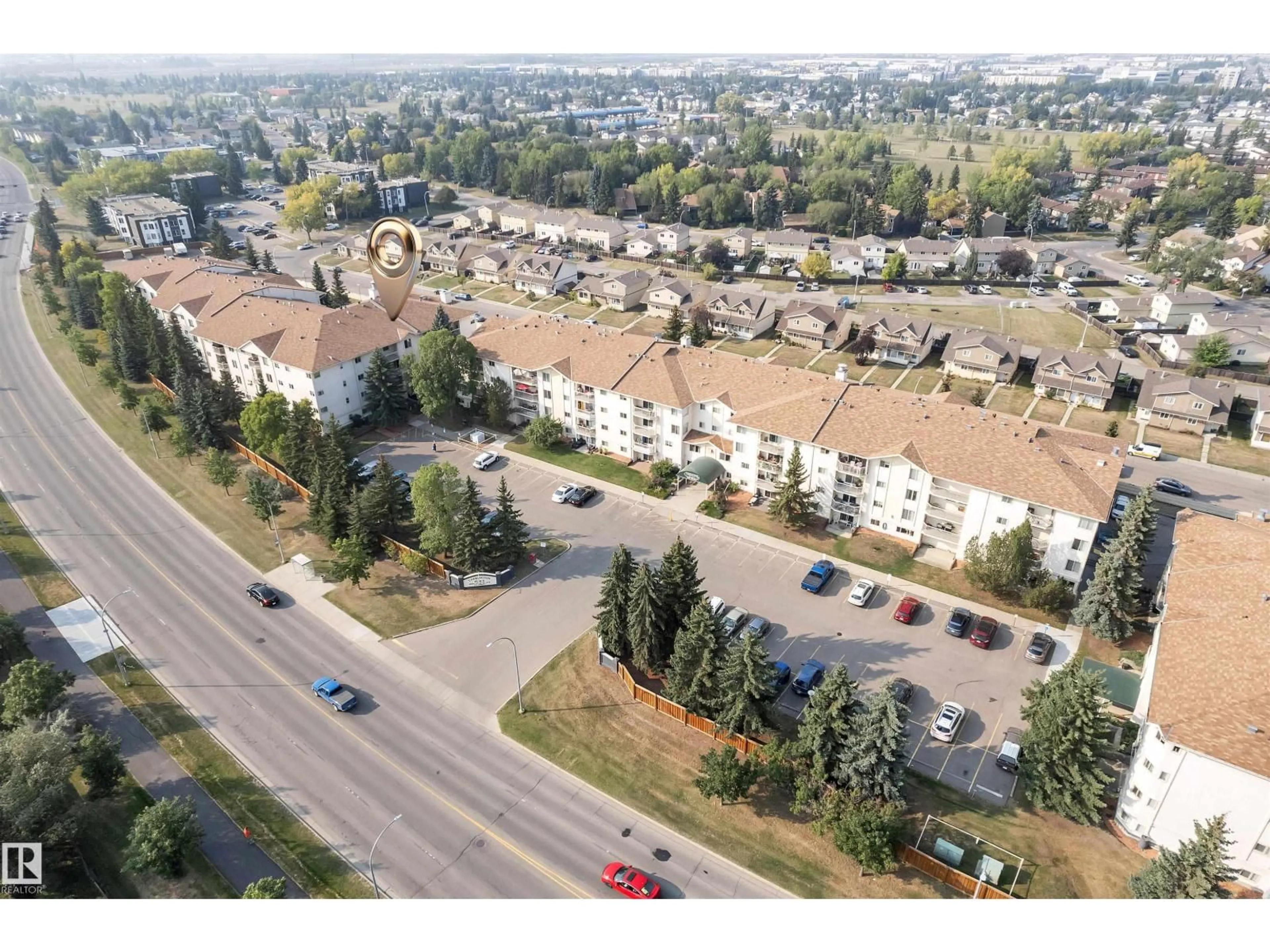 A pic from outside/outdoor area/front of a property/back of a property/a pic from drone, mountain view for #306 - 18020 95 AV, Edmonton Alberta T5T6B2