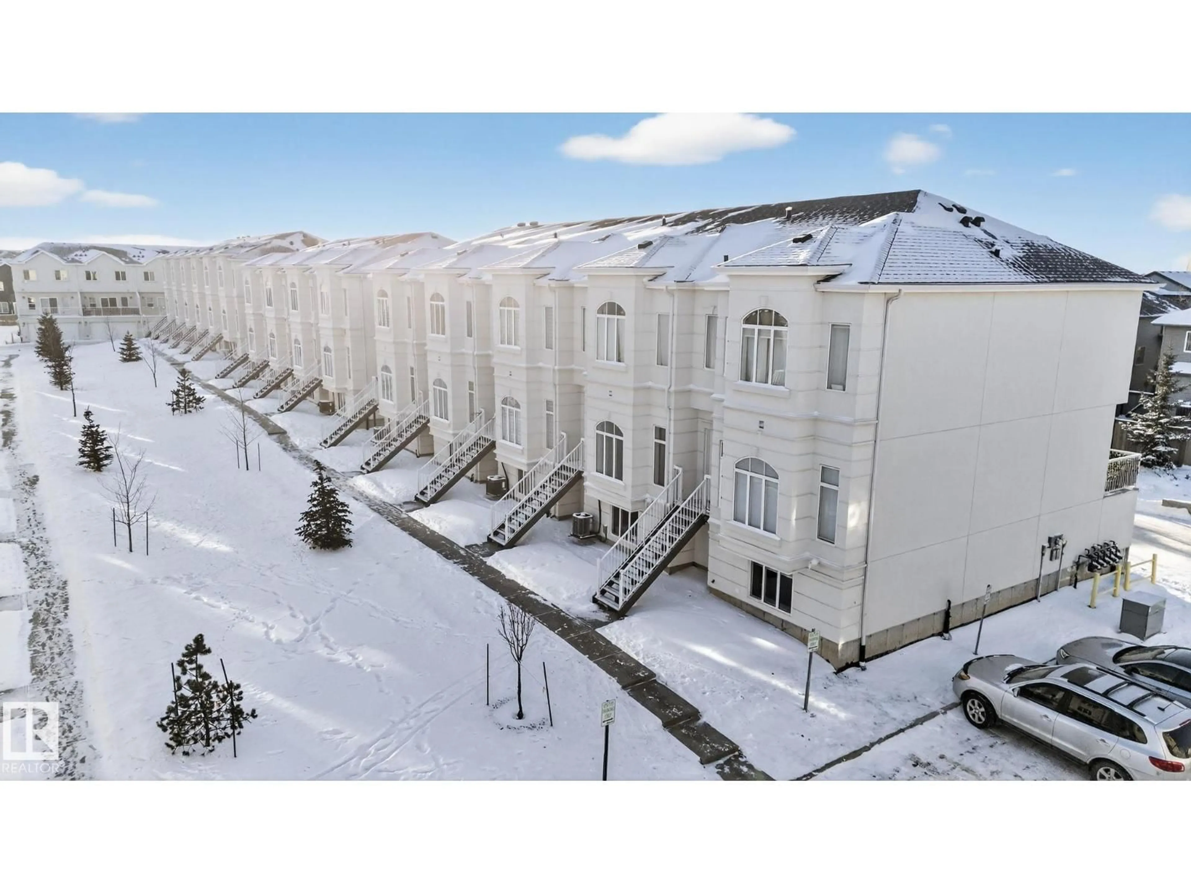 A pic from outside/outdoor area/front of a property/back of a property/a pic from drone, building for 64 723 172 ST SW, Edmonton Alberta T6W2N6