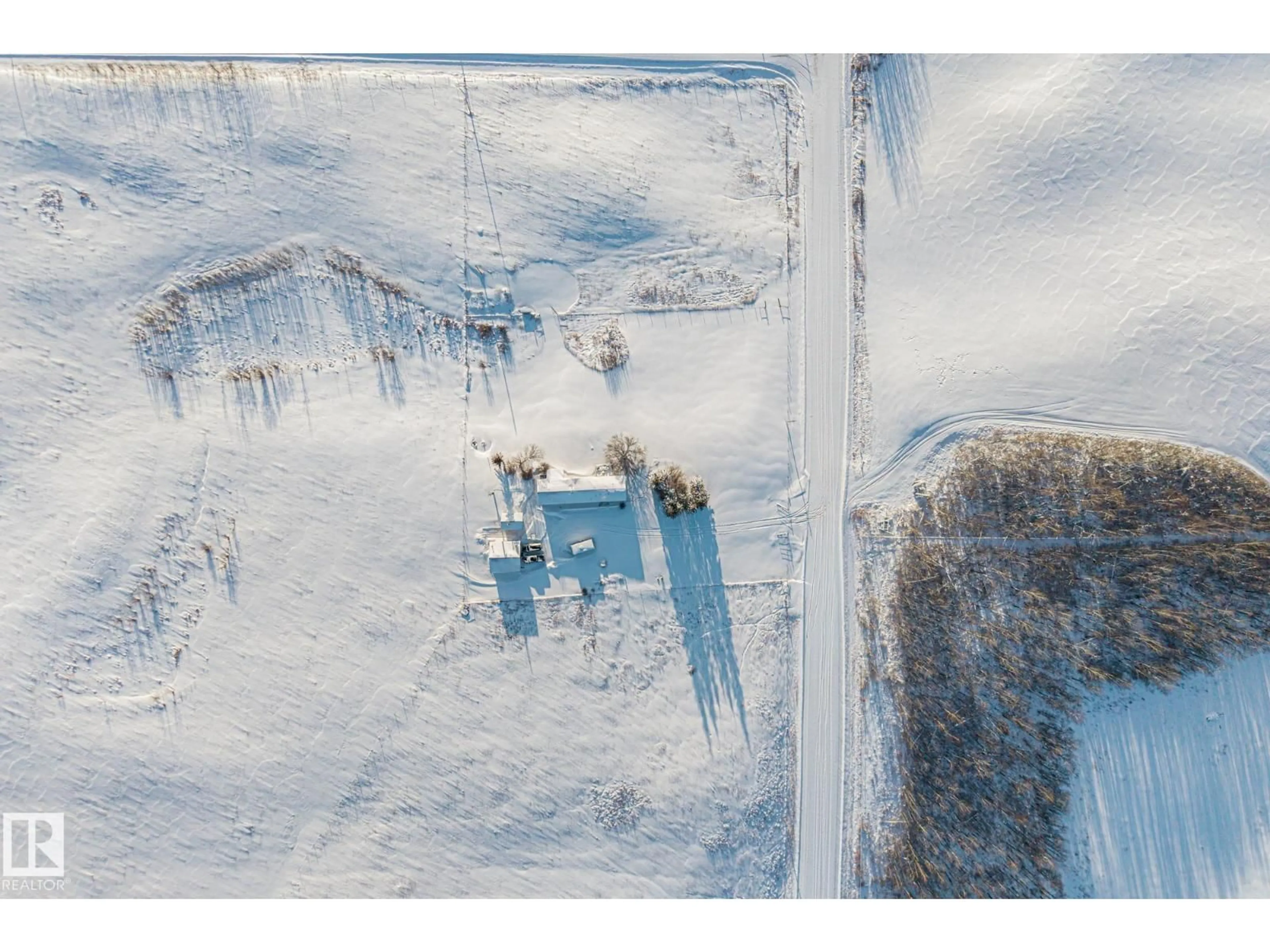 A pic from outside/outdoor area/front of a property/back of a property/a pic from drone, unknown for 57303 RANGE ROAD 42, Rural Lac Ste. Anne County Alberta T0E0J0