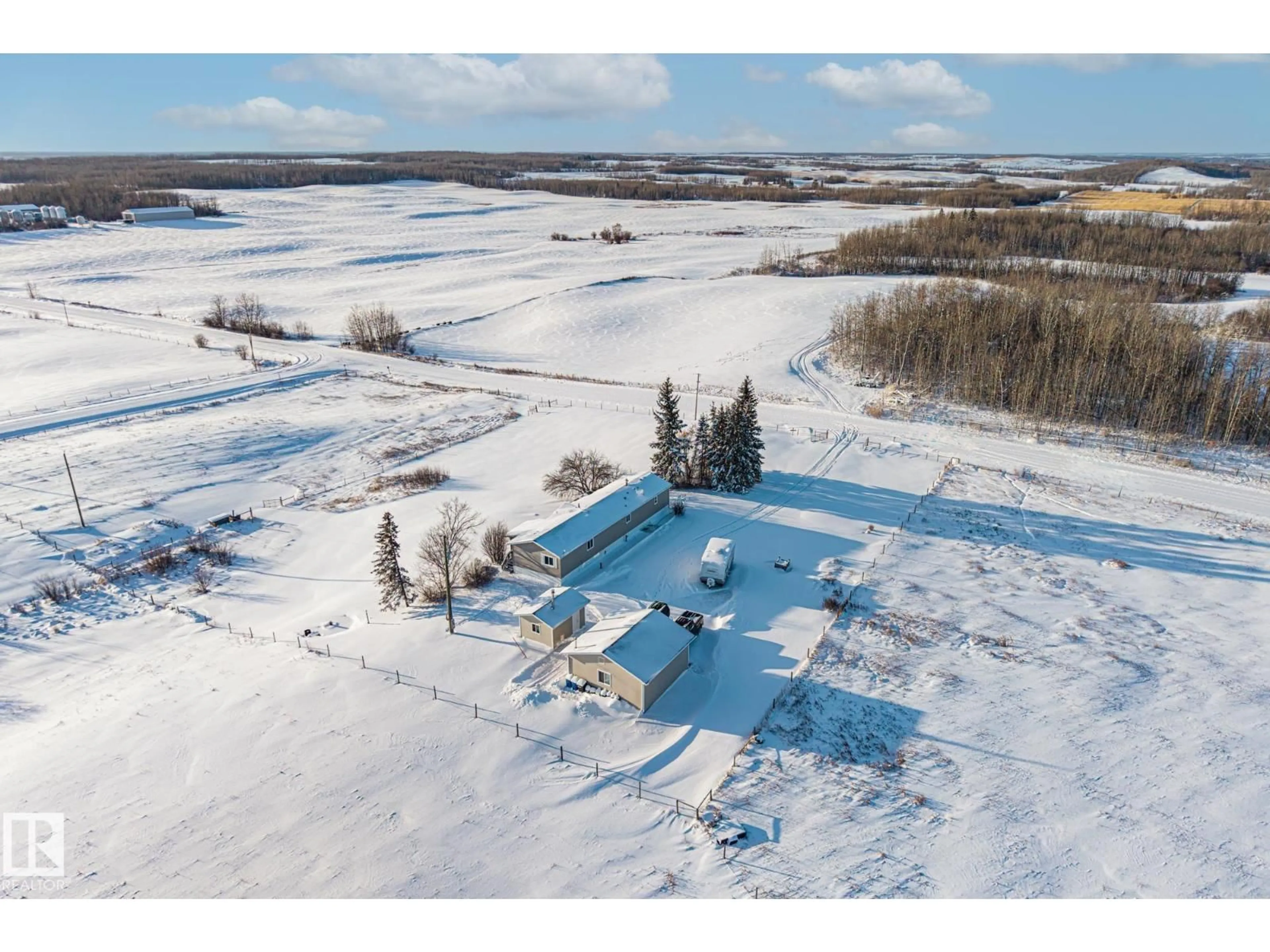 A pic from outside/outdoor area/front of a property/back of a property/a pic from drone, water/lake/river/ocean view for 57303 RANGE ROAD 42, Rural Lac Ste. Anne County Alberta T0E0J0