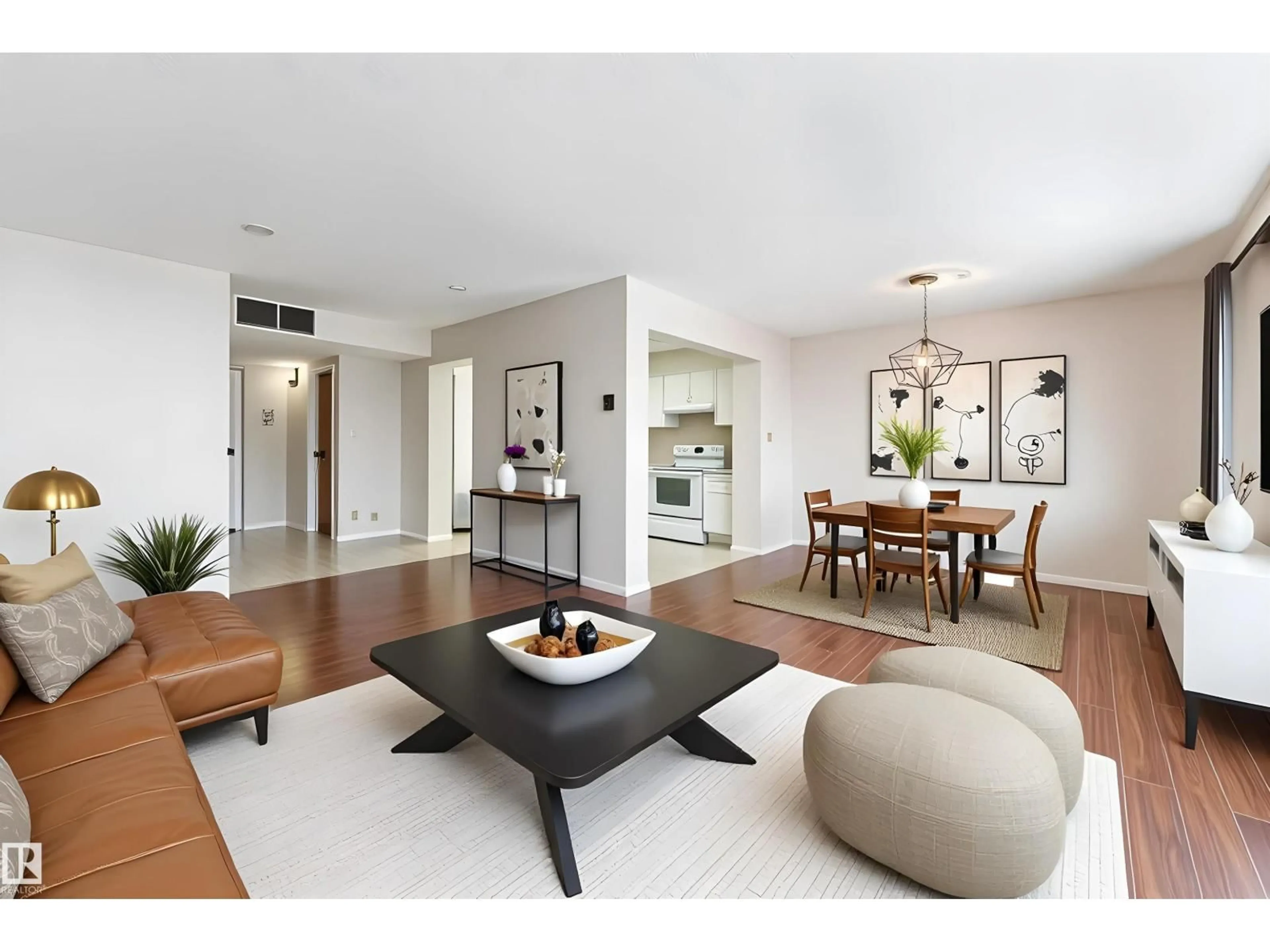 Living room with furniture, wood/laminate floor for 702 - 8340 JASPER AV NW, Edmonton Alberta T5H4C6