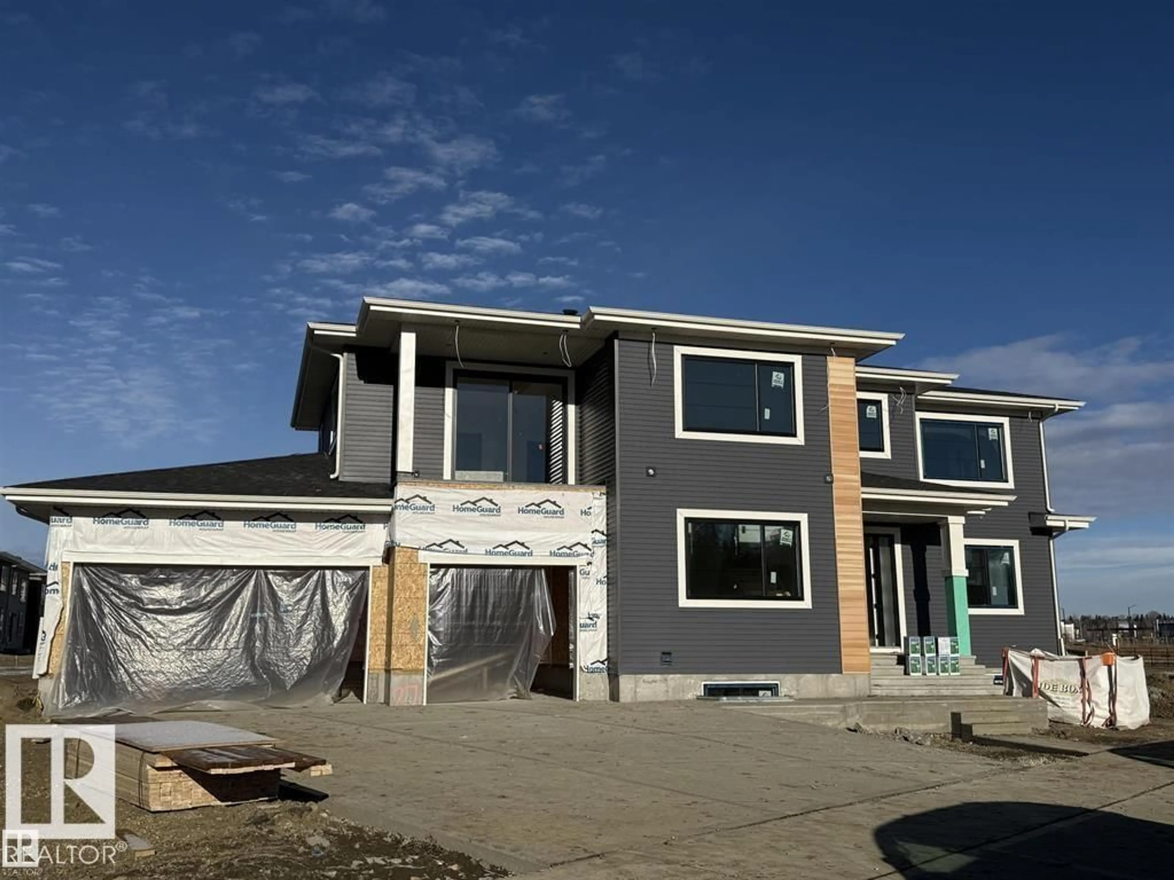 Home with vinyl exterior material, street for 27 REDPOLL WD, St. Albert Alberta T8N8C7