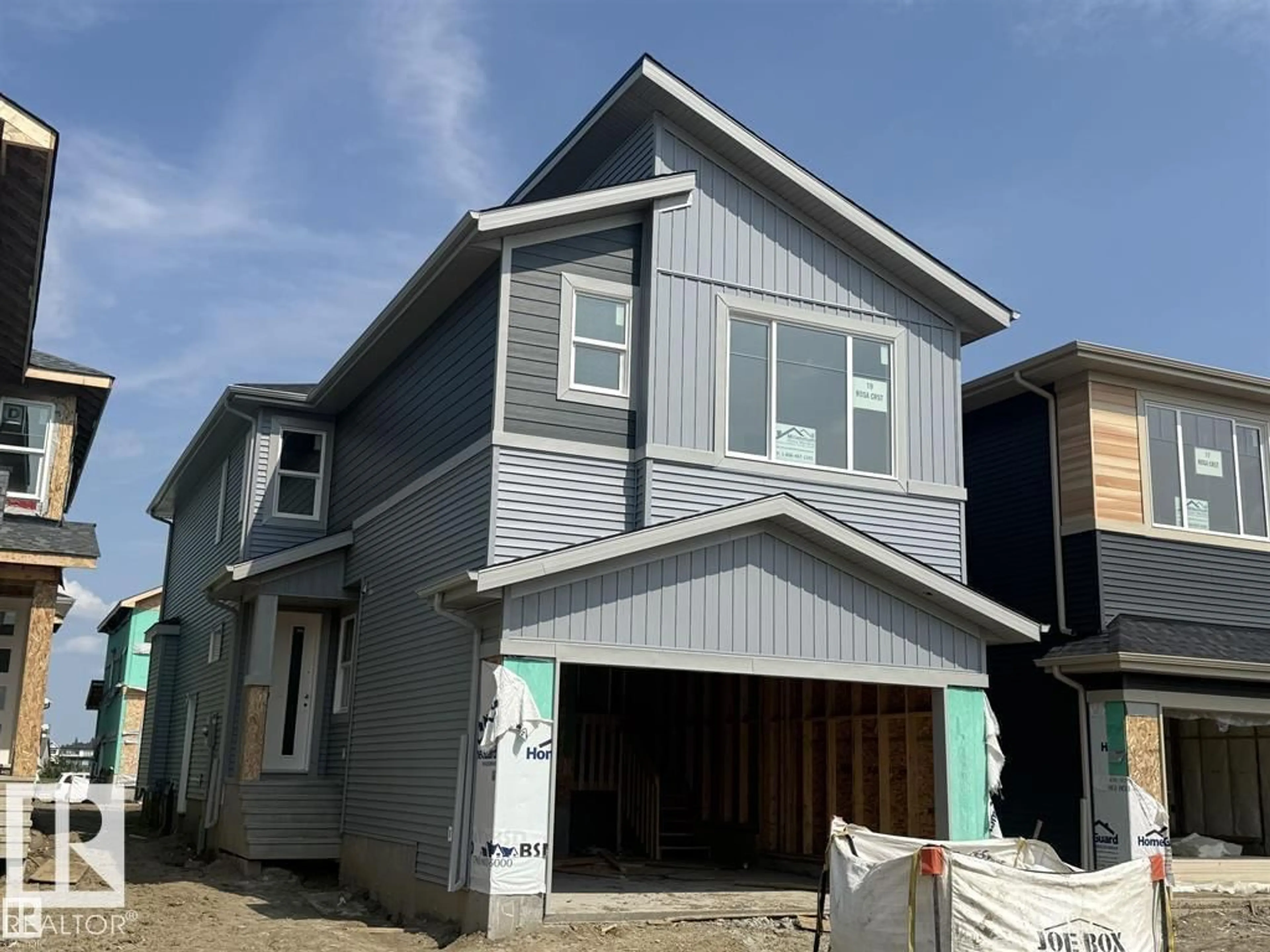Home with vinyl exterior material, street for 19 ROSA CR, St. Albert Alberta T8N7Y4