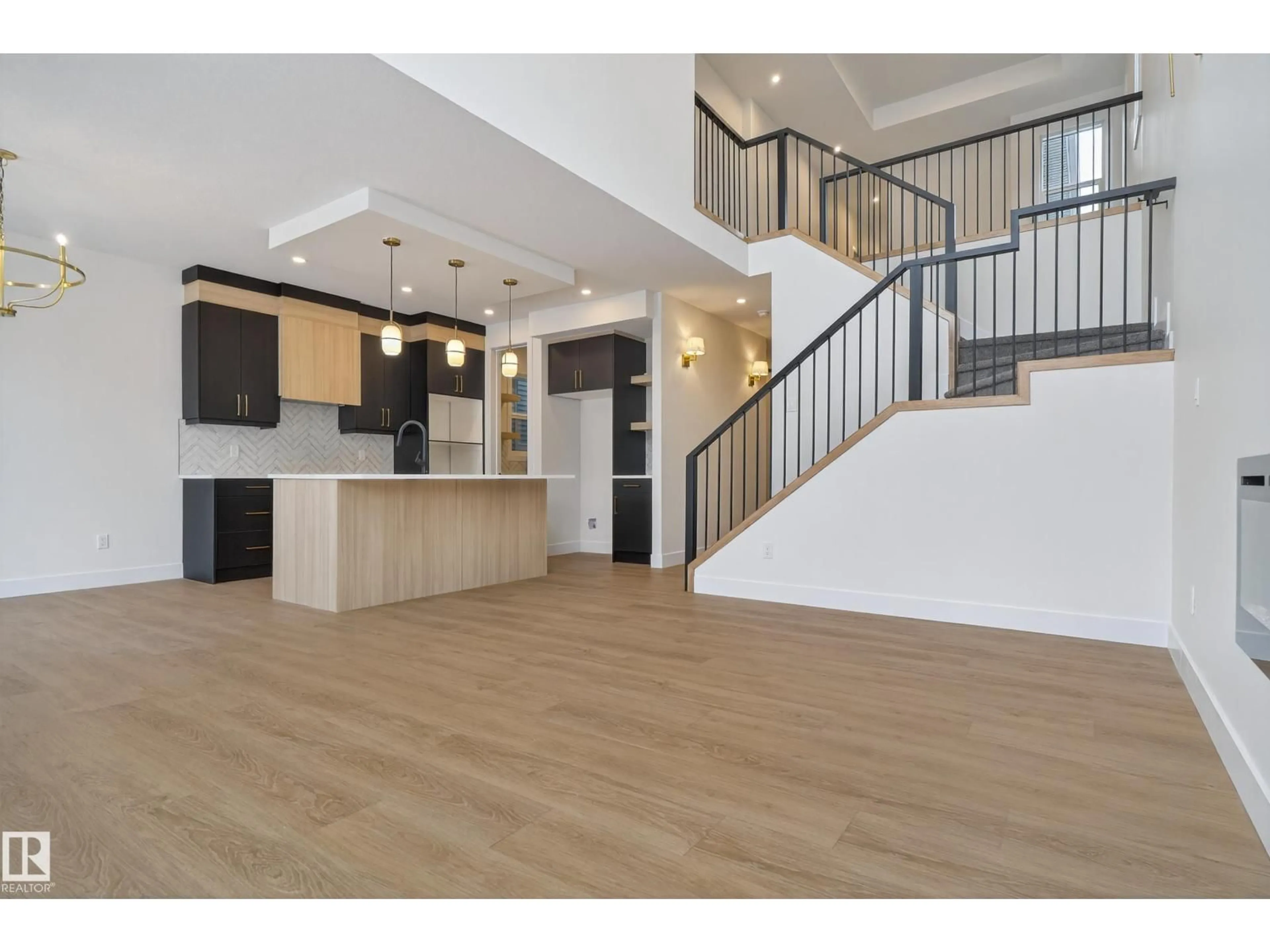 Open concept kitchen, wood/laminate floor for 19 ROSA CR, St. Albert Alberta T8N7Y4