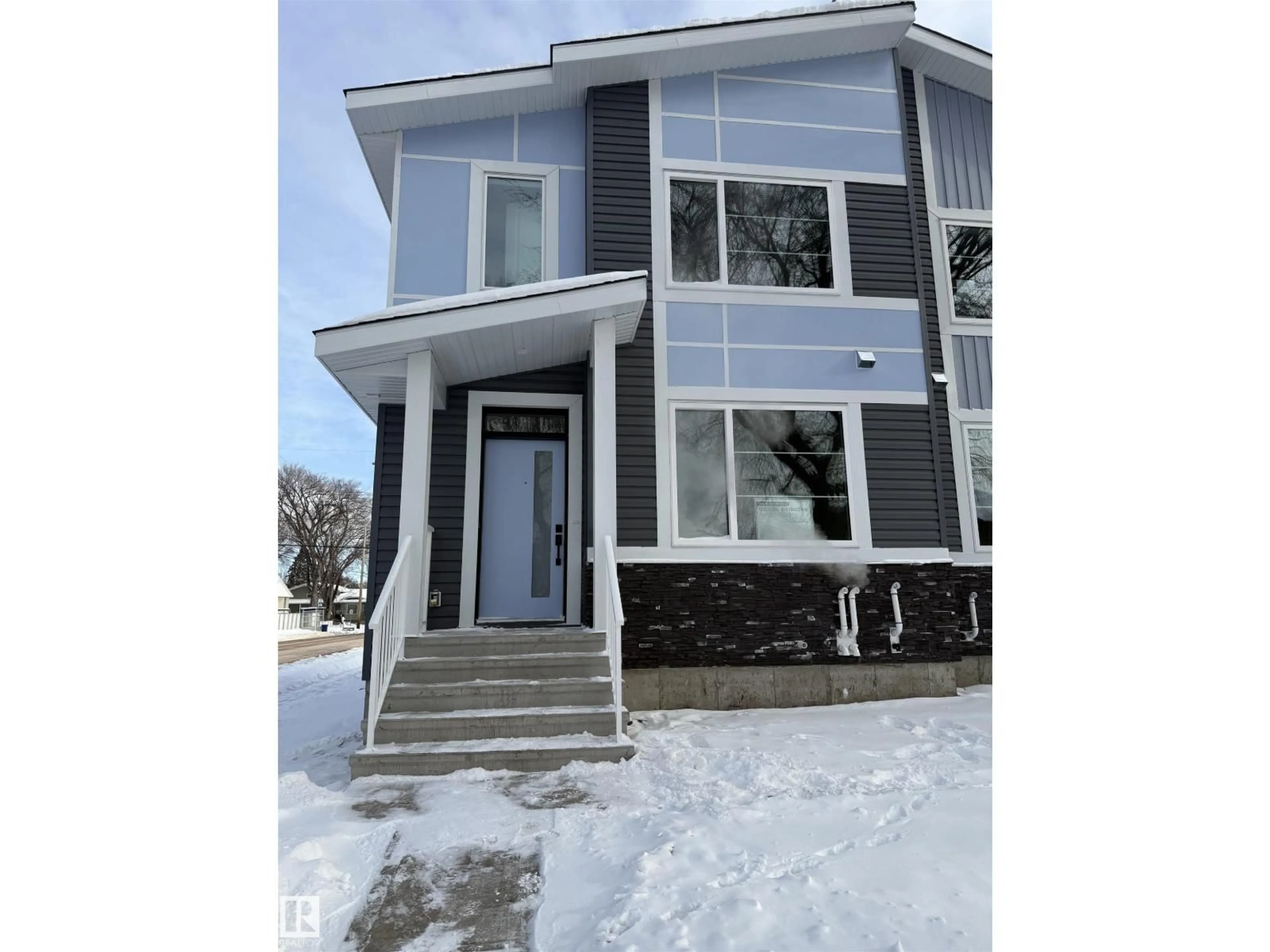 Home with vinyl exterior material, street for 12039 41 ST, Edmonton Alberta T5W2M3
