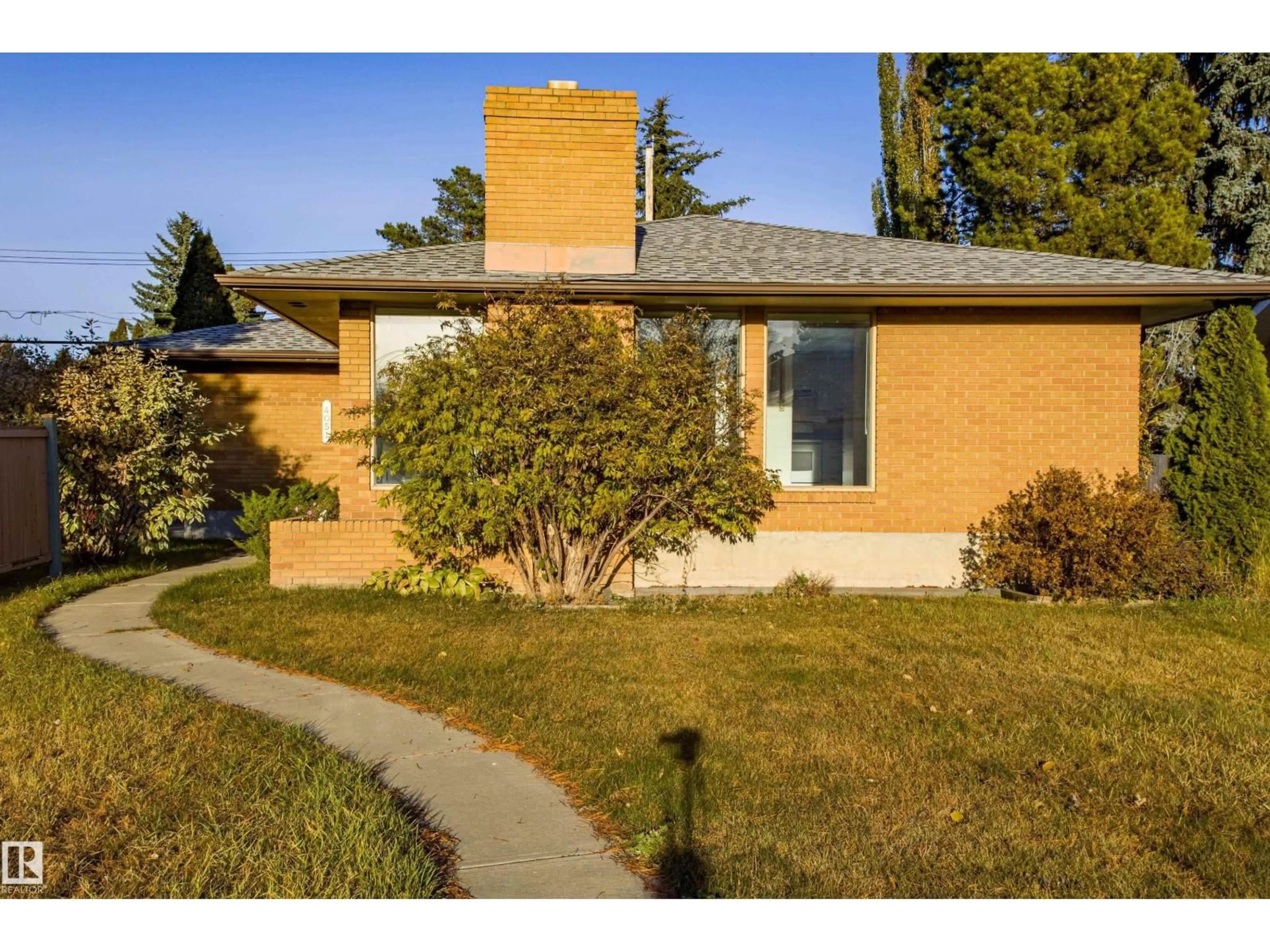 Home with brick exterior material, street for NW - 4051 120 ST, Edmonton Alberta T6J1X7